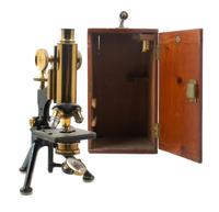 An English Brass and Black Lacquered Microscope Height 12 1/2 inches. — W. WATSON & SONS LTD., LONDON, EARLY 20TH CENTURY