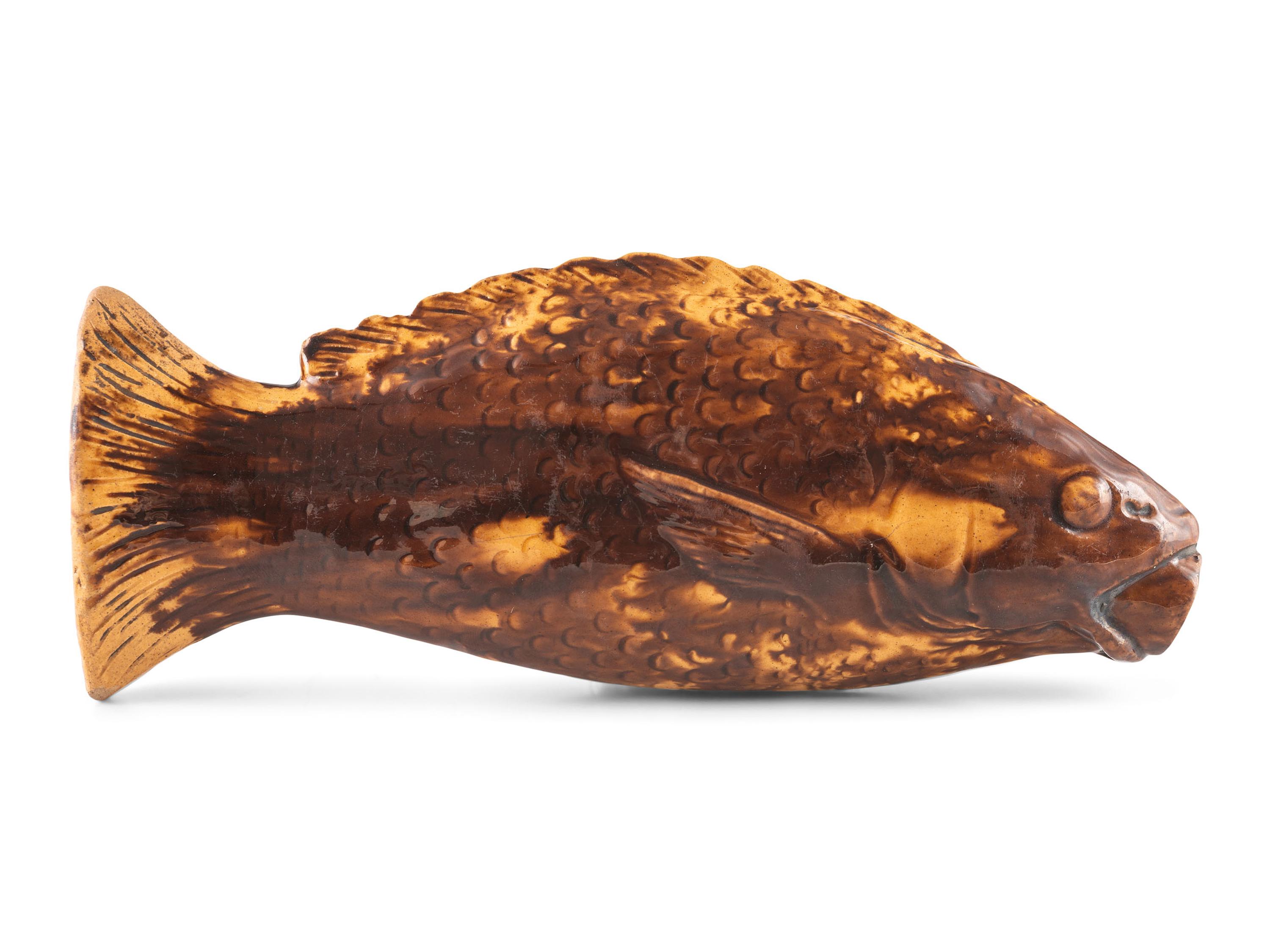 A Yellowware Rockingham Glaze Fish Flask