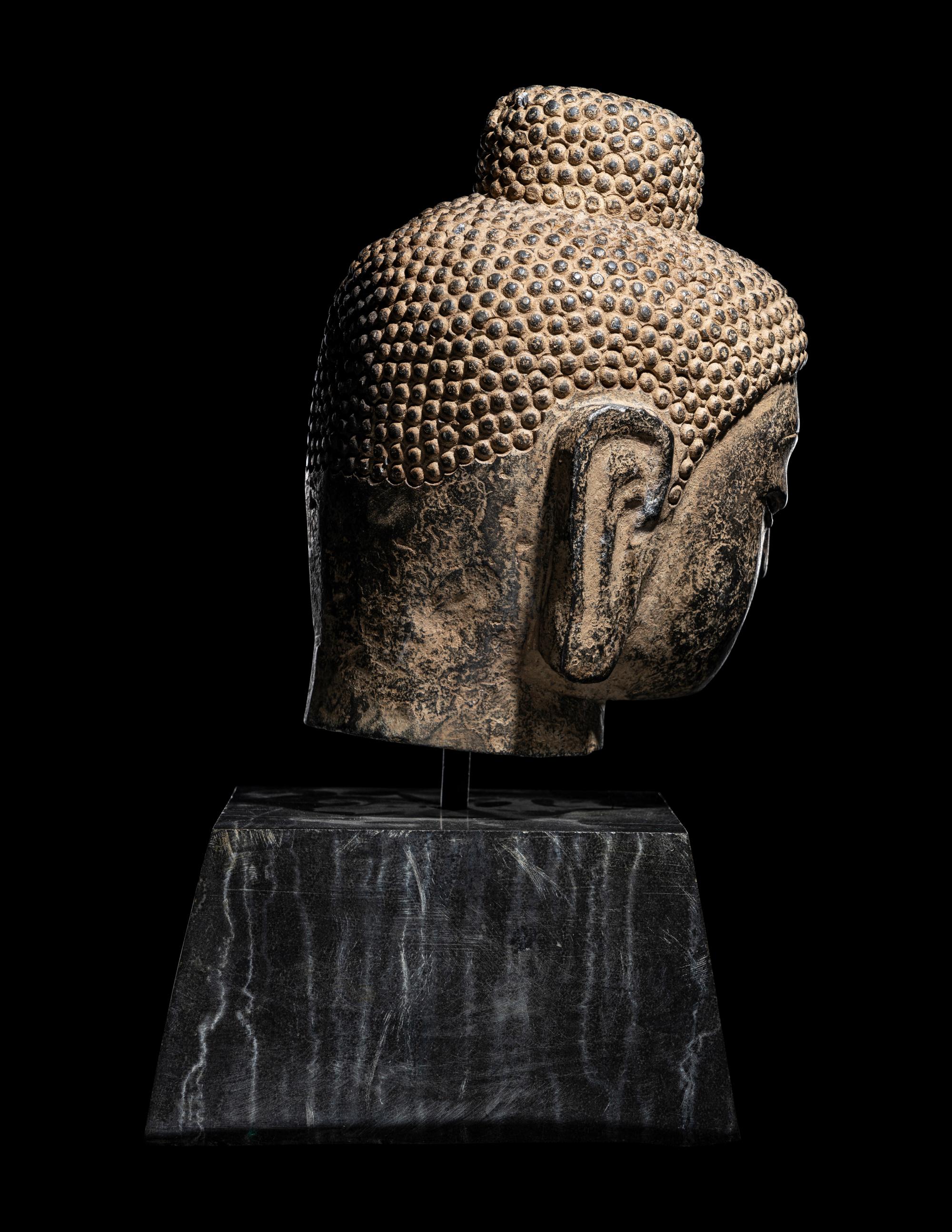 A Chinese Carved Stone Head of Buddha