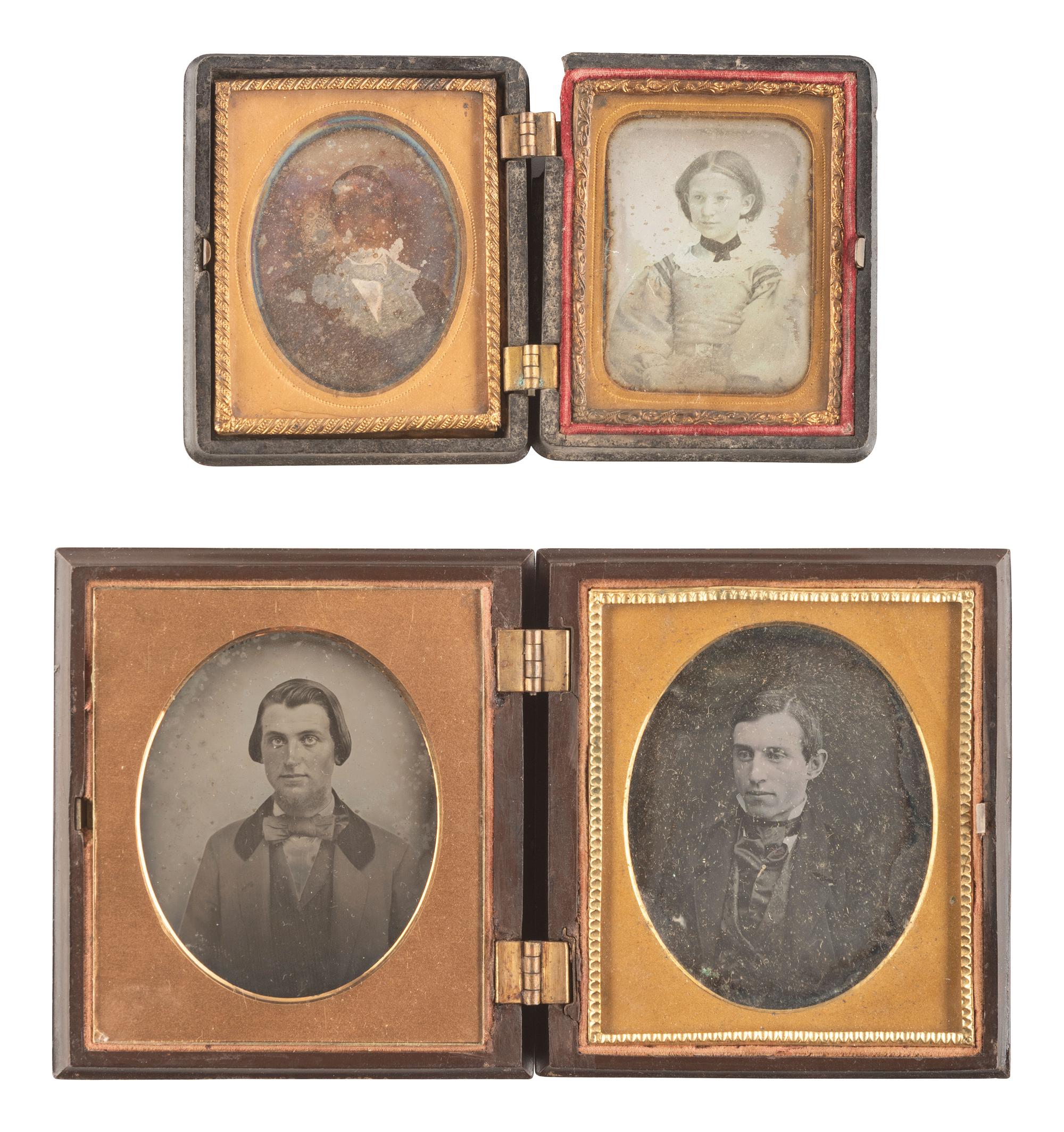 [EARLY PHOTOGRAPHY]. 28 daguerreotypes housed in pairs within side-by-side cases.