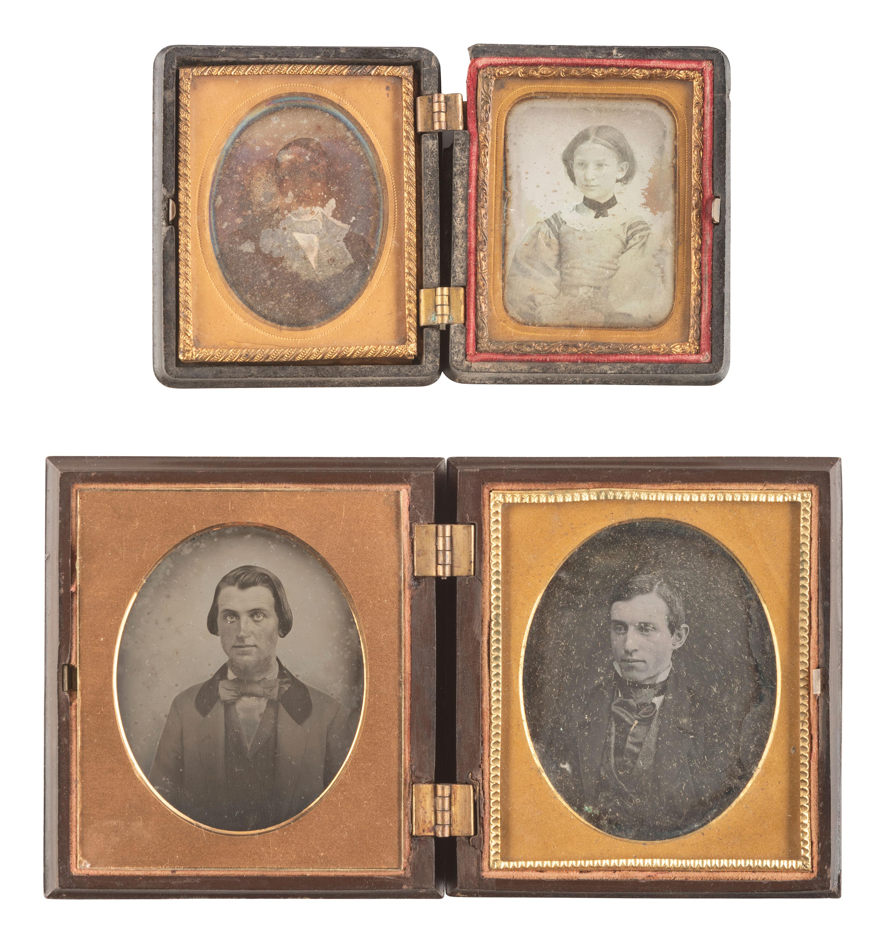 [EARLY PHOTOGRAPHY]. 28 daguerreotypes housed in pairs within side-by-side cases.