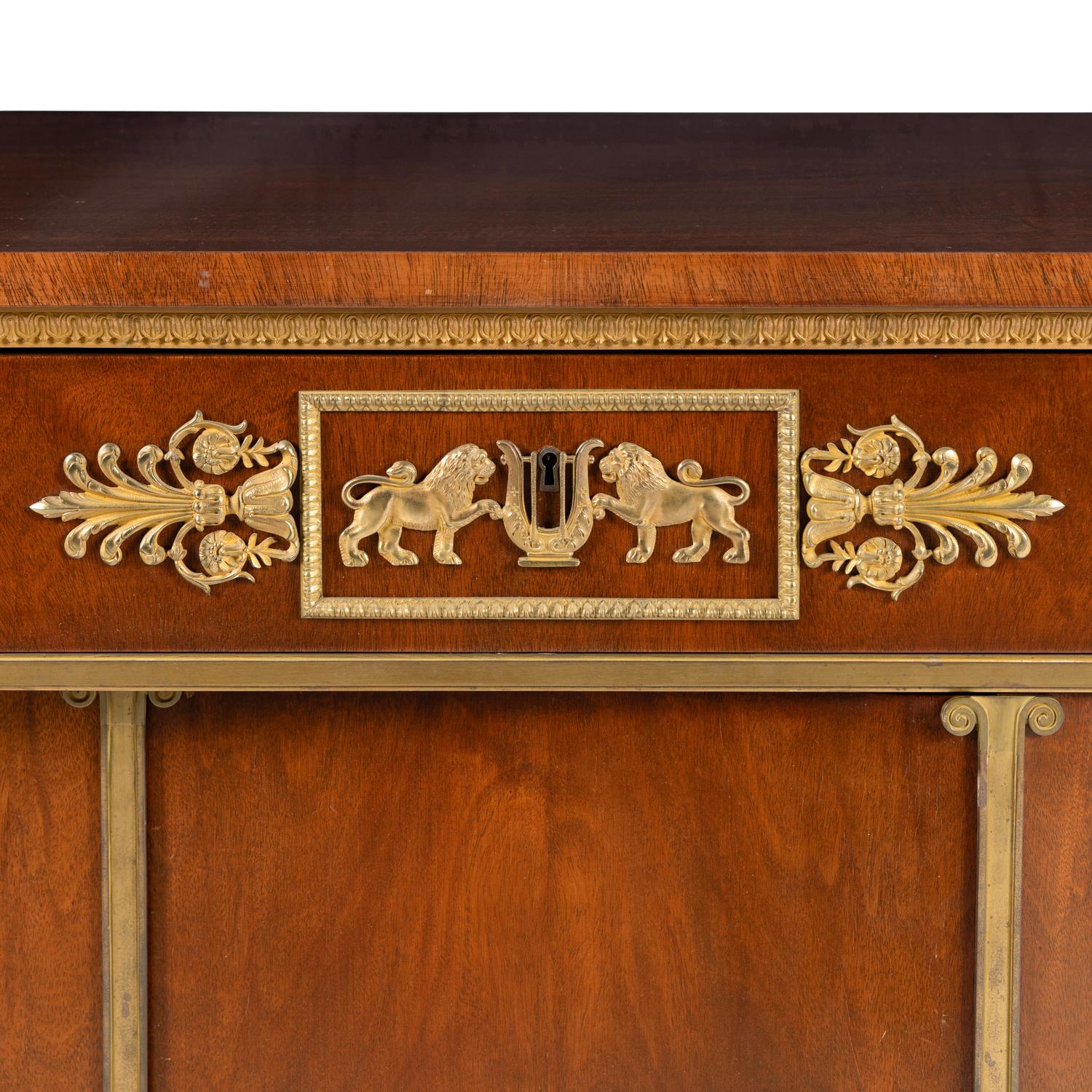 An Empire Style Gilt Bronze Mounted Mahogany Side Cabinet