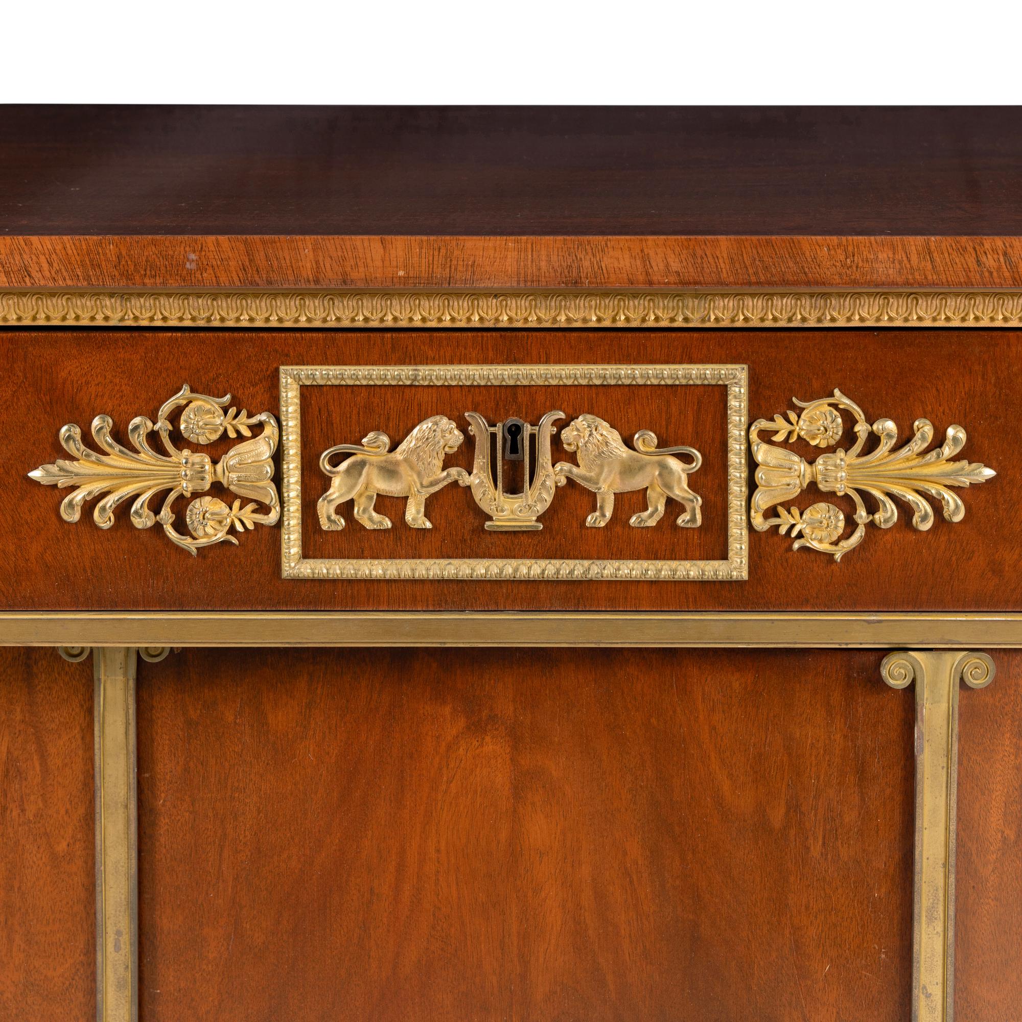 An Empire Style Gilt Bronze Mounted Mahogany Side Cabinet