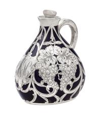 A Porcelain Silver Overlay Pitcher Height 7 inches.