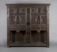 A Renaissance Revival Carved Oak Court Cupboard, Height 77 x width 79 1/2 x depth 22 3/4 inches.
