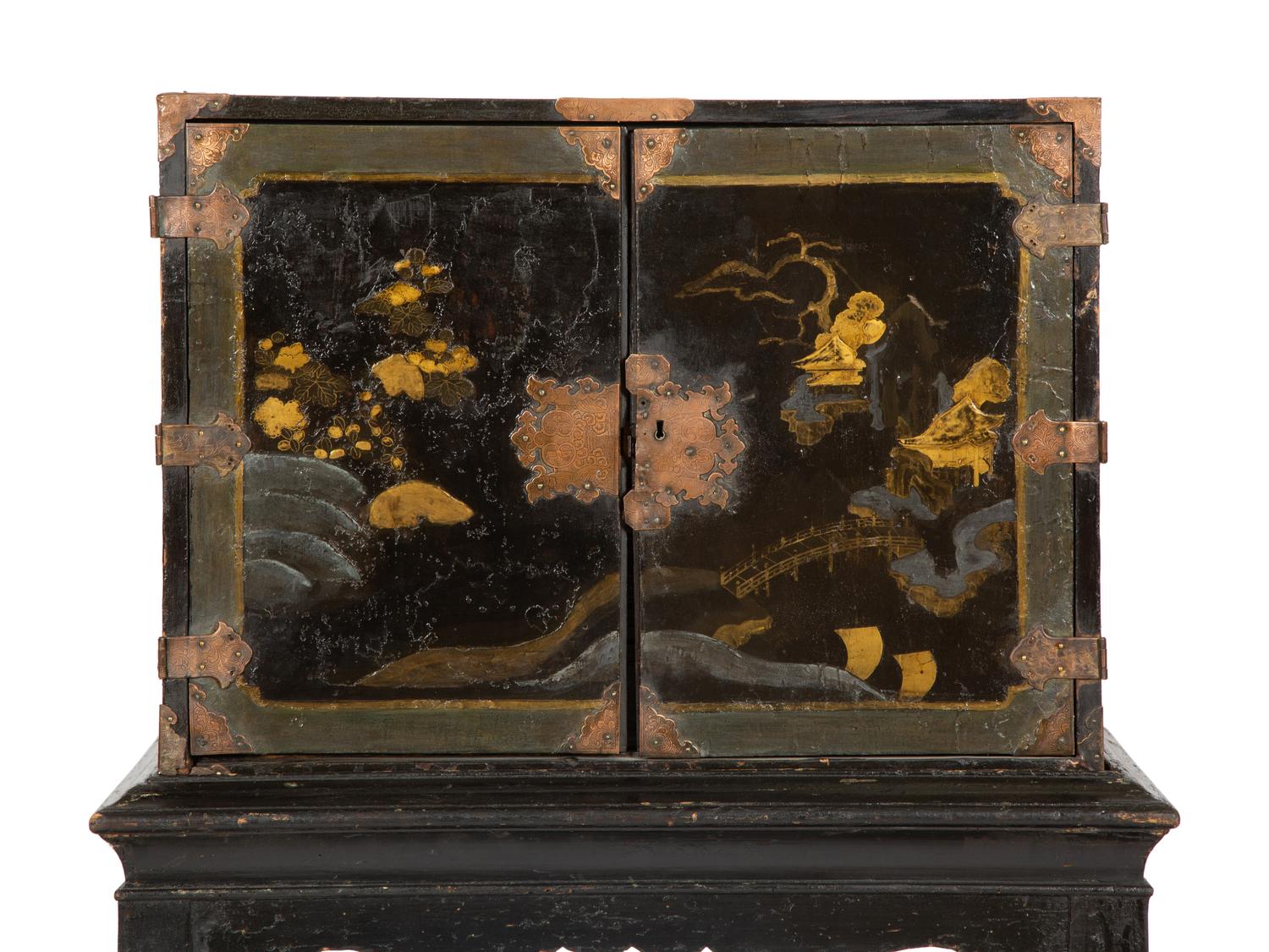 A Chinese Black and Gilt Lacquered Cabinet on Stand