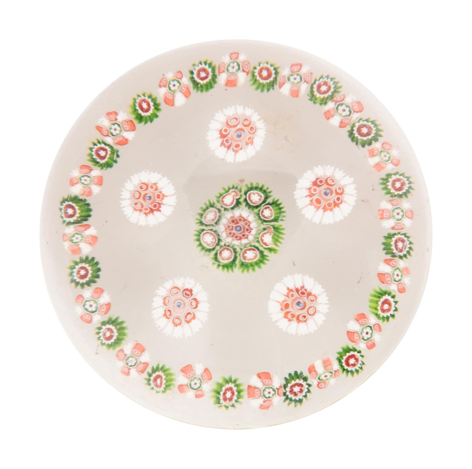 A Saint Louis Spaced Concentric Millefiori Glass Paperweight