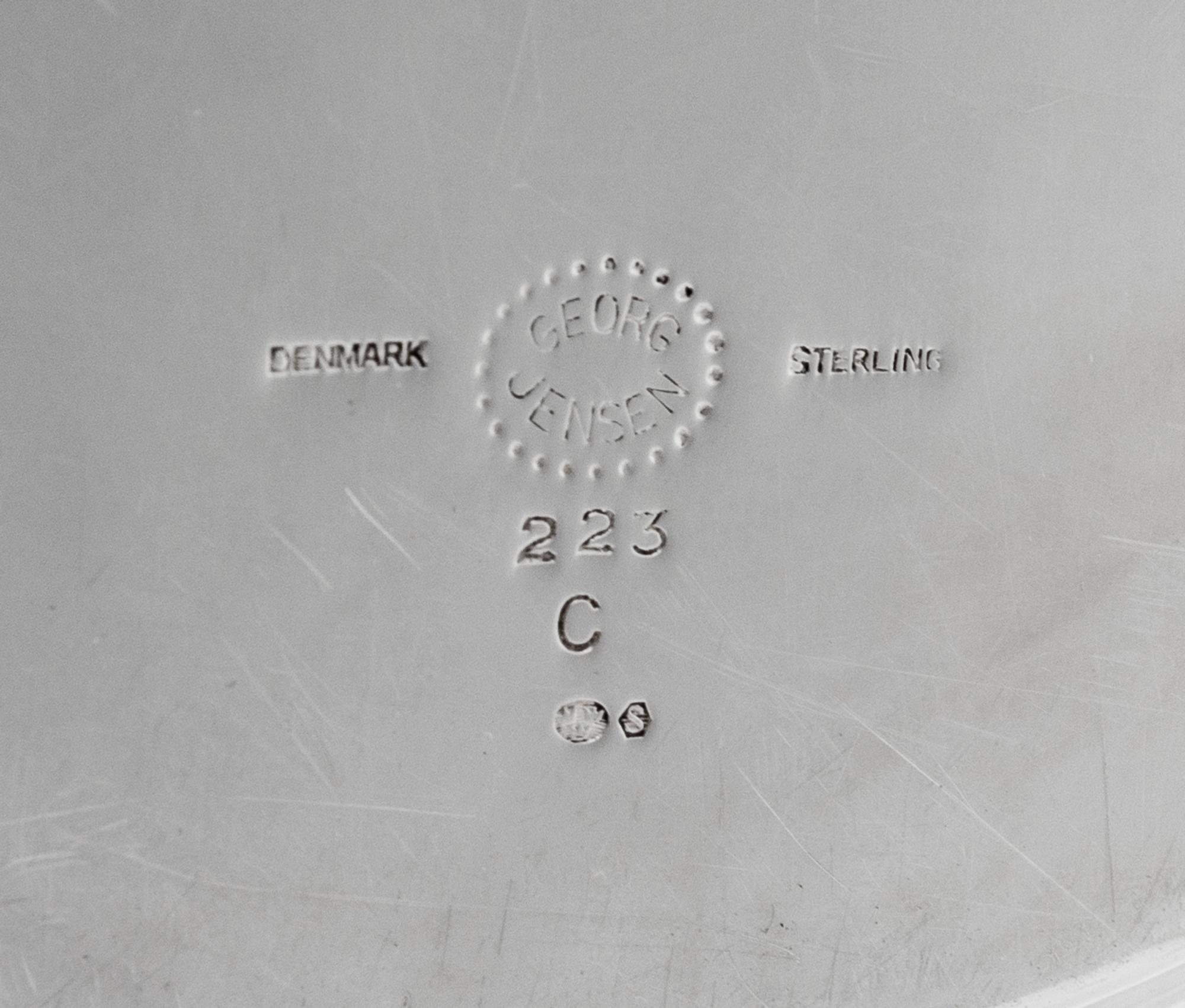 A Danish Silver Serving Tray, Georg Jensen Silversmithy, Copenhagen, Second Half 20th Century, of simple oval form with molded rim, mod
