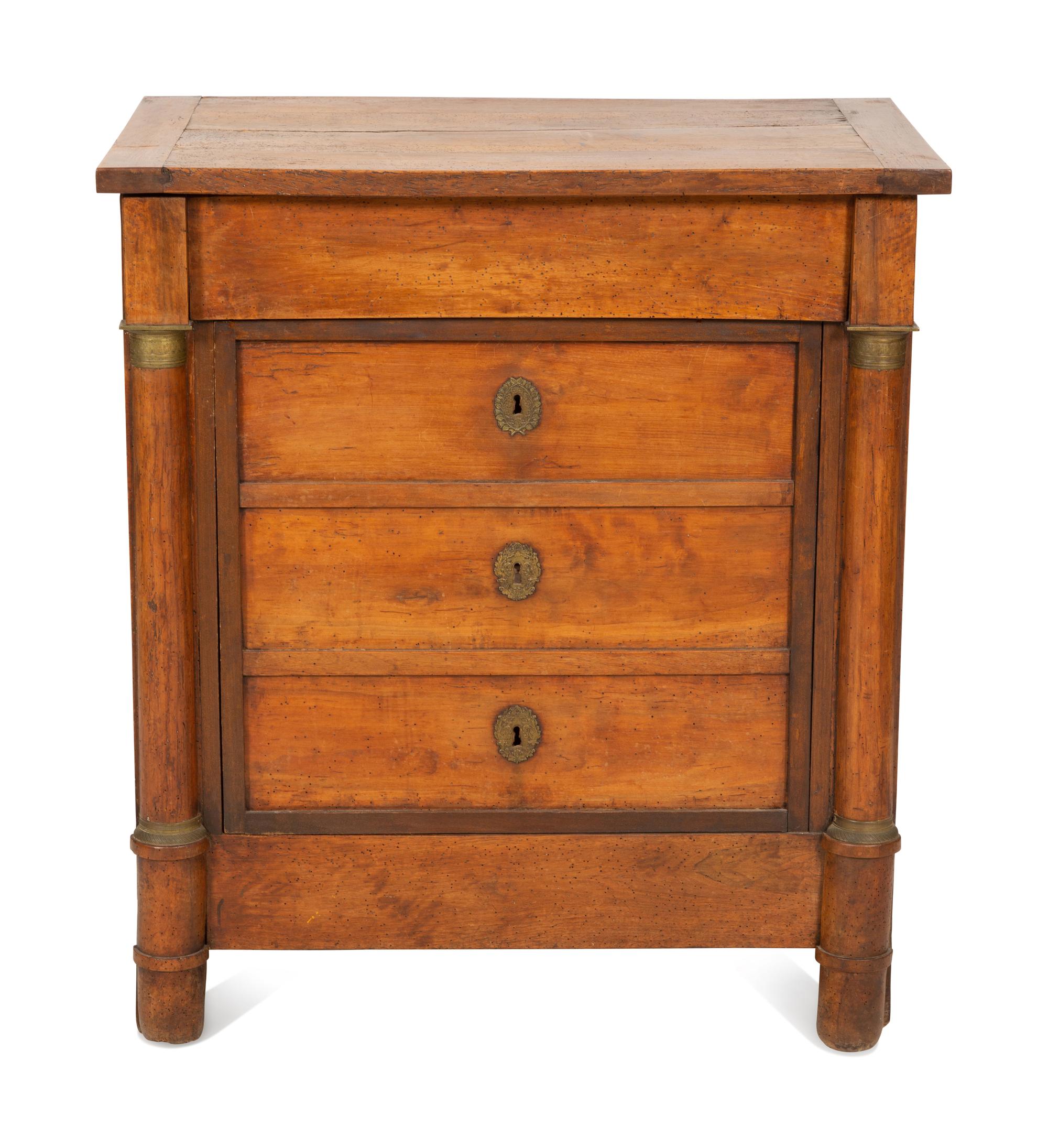 An Empire Walnut Cabinet