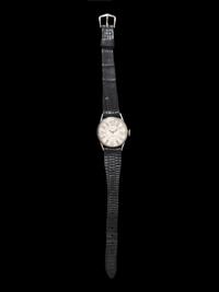TIFFANY AND CO., C.H. MEYLAN, PLATINUM AND DIAMOND WATCH
