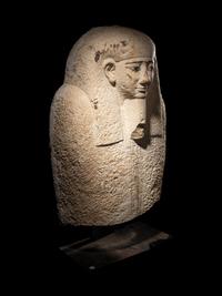 An Egyptian Limestone Sarcophagus Lid