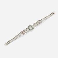 An Art Deco emerald, diamond, and platinum bracelet