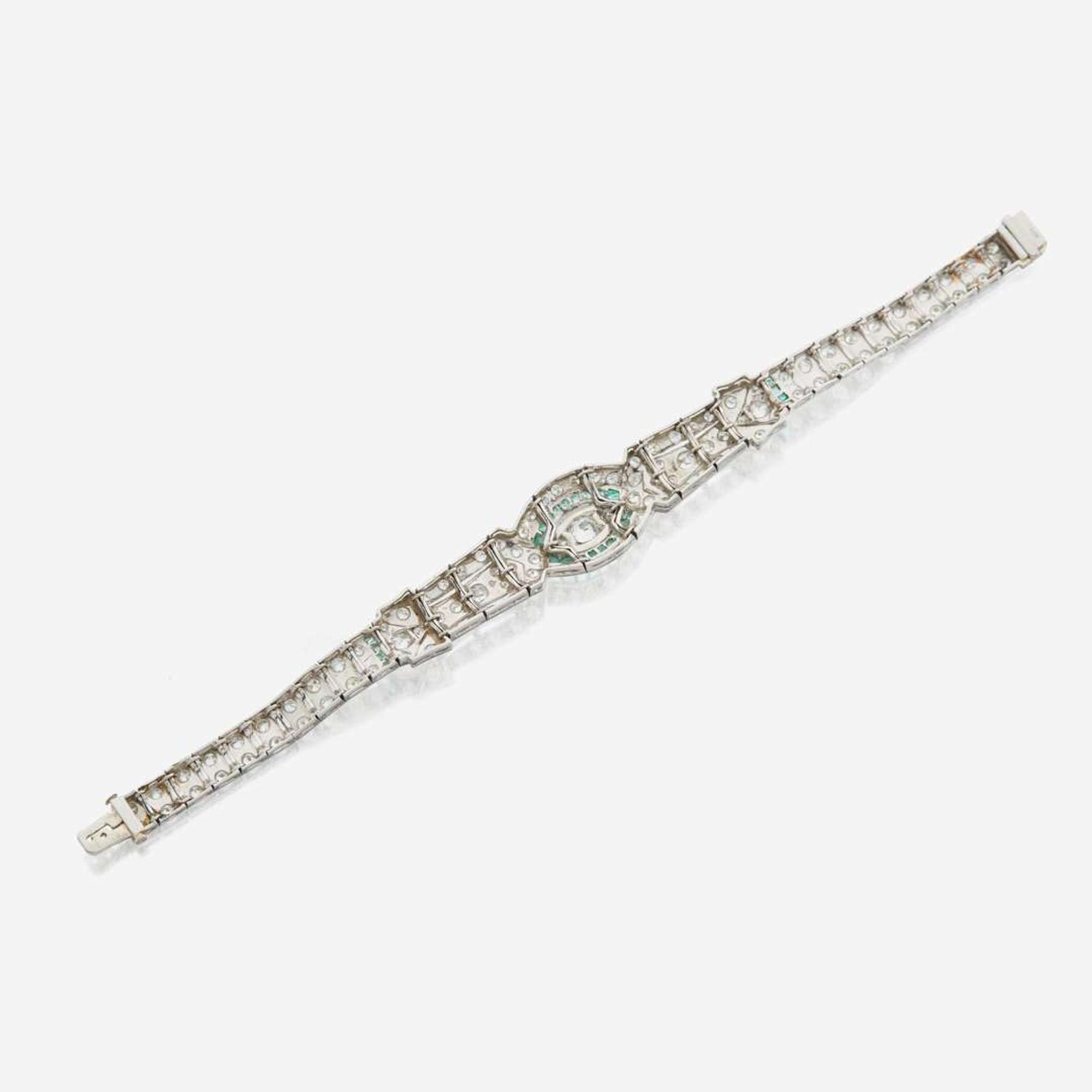 An Art Deco emerald, diamond, and platinum bracelet