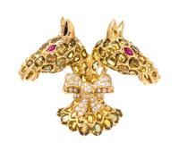 An 18 Karat Yellow Gold, Sapphire, Ruby and Diamond Twin Horse Head Brooch, Tiffany & Co., 30.90 dwts.