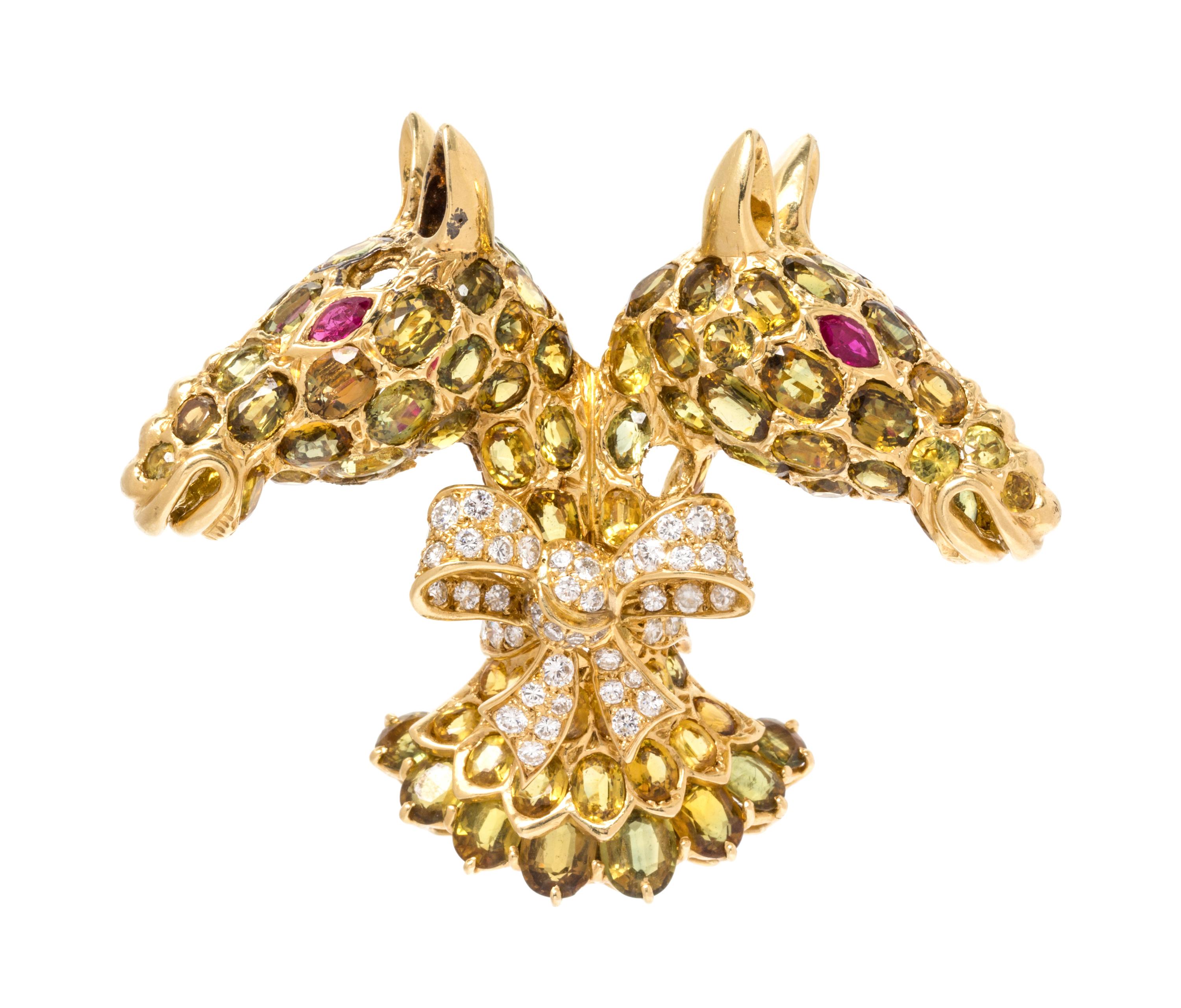 An 18 Karat Yellow Gold, Sapphire, Ruby and Diamond Twin Horse Head Brooch, Tiffany & Co., 30.90 dwts.