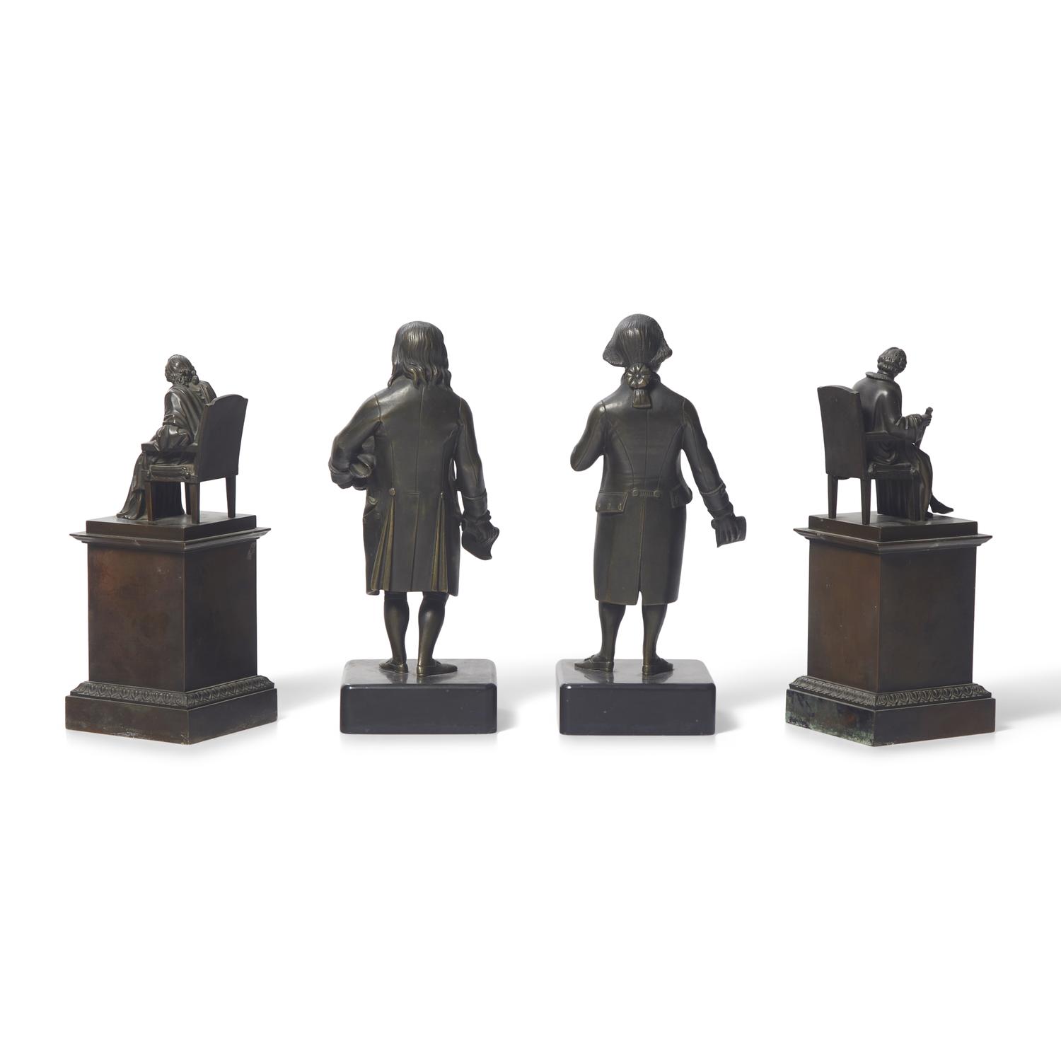A Group of Four Patinated Bronze Figures or Bookends