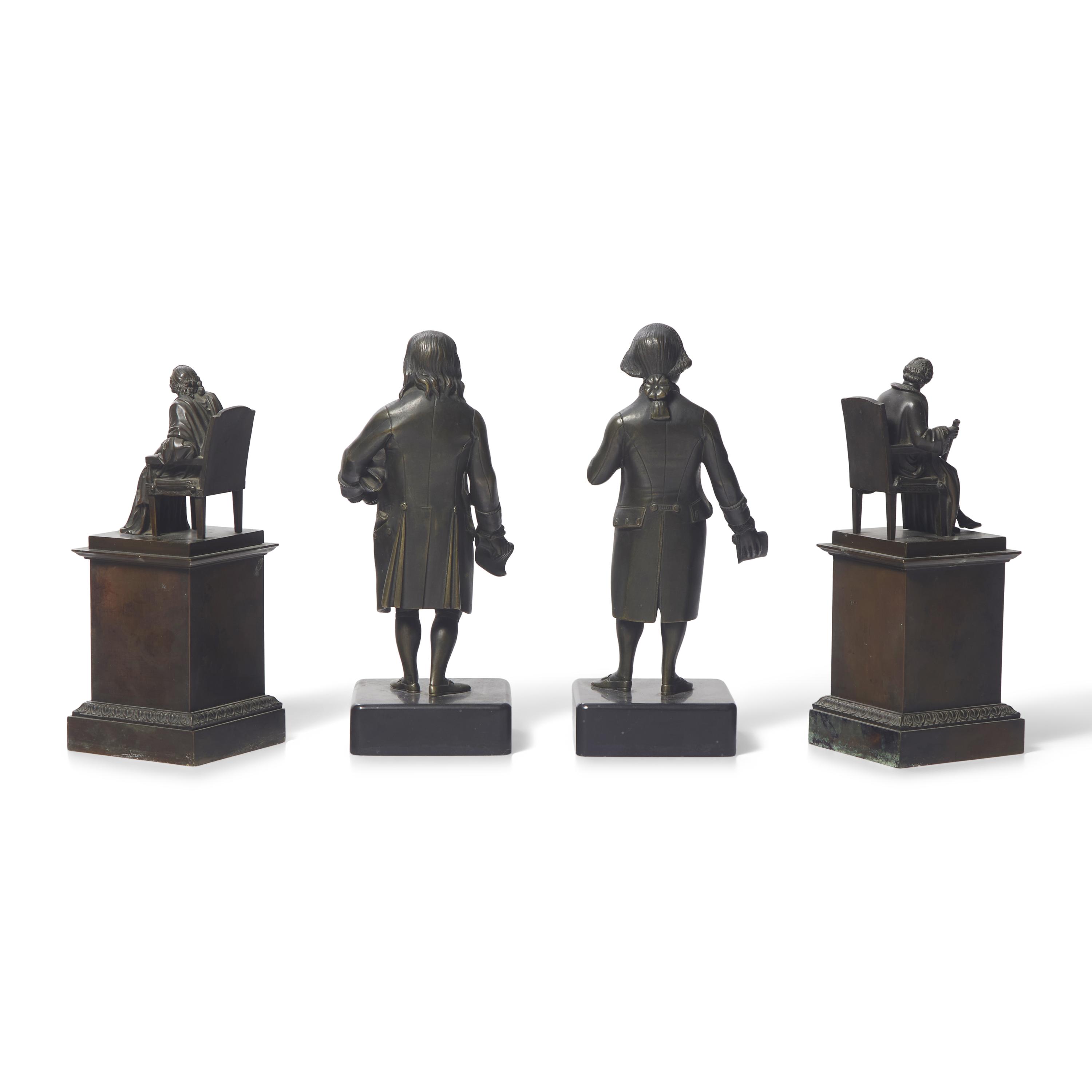 A Group of Four Patinated Bronze Figures or Bookends