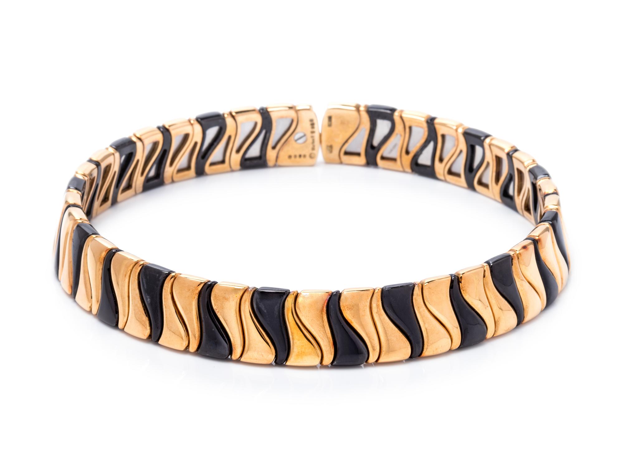 An 18 Karat Yellow Gold and Blackened Stainless Steel Collar Necklace, Marina B., Circa 1986,