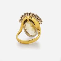 An 18K Yellow Gold, Platinum, Diamond, and Yellow Sapphire Ring