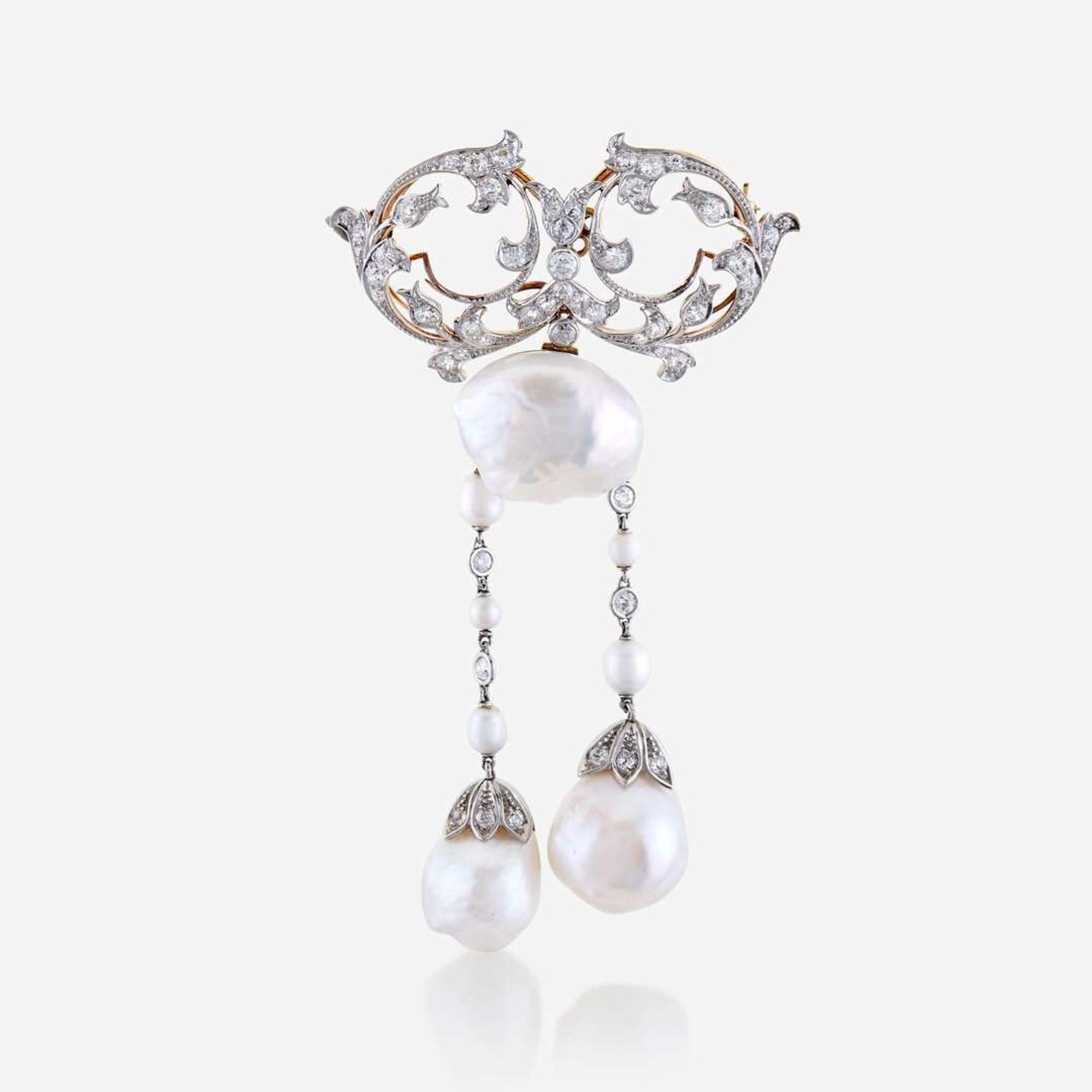 A natural pearl, diamond, eighteen karat gold, and platinum brooch