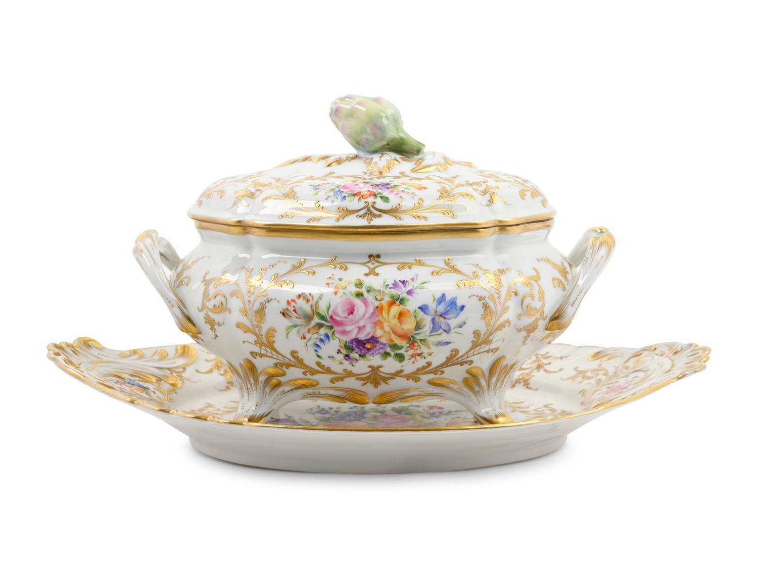 A French Parcel Gilt and Hand Painted Porcelain Tureen