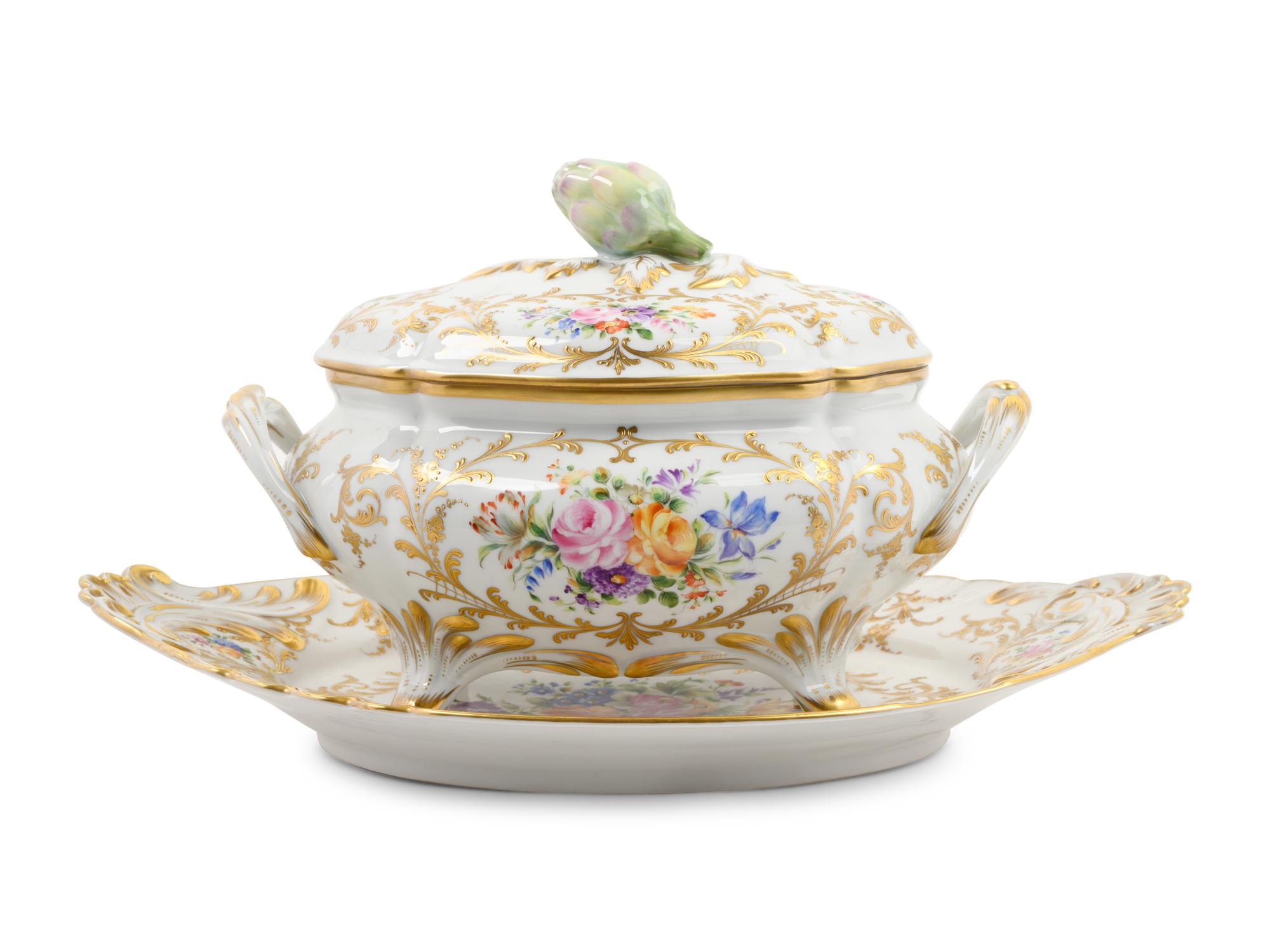 A French Parcel Gilt and Hand Painted Porcelain Tureen