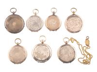 [EARLY PHOTOGRAPHY]. A group of 7 lockets containing 13 daguerreotype, ambrotype, and tintype portraits.