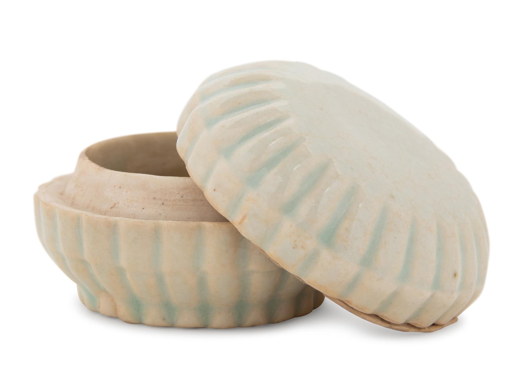 A Qingbai Glazed 'Chrysanthemum' Porcelain Box and Cover