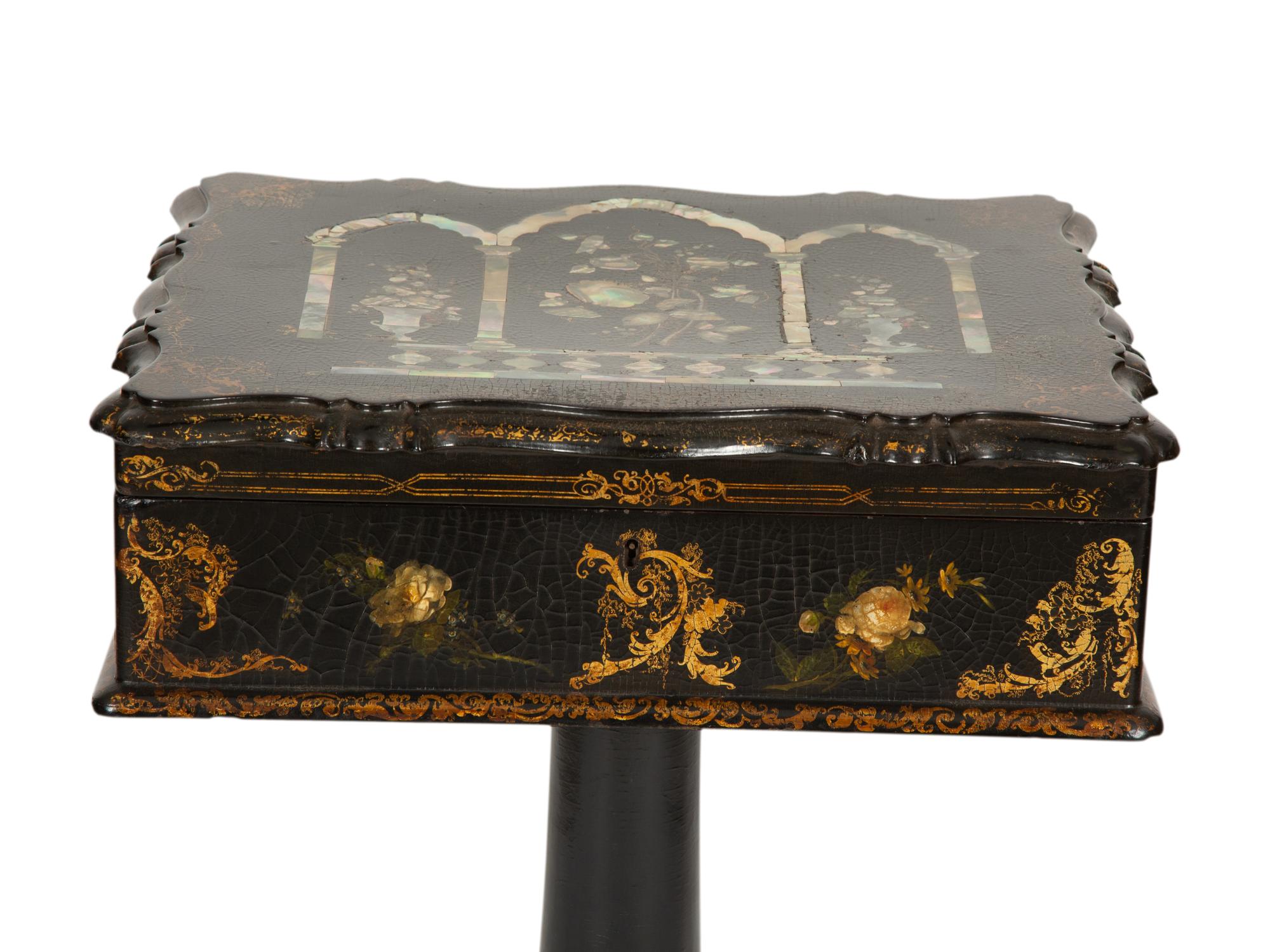 An English Victorian Black and Gilt Chinoiserie Sewing Table with Mother-of-Pearl Inlay