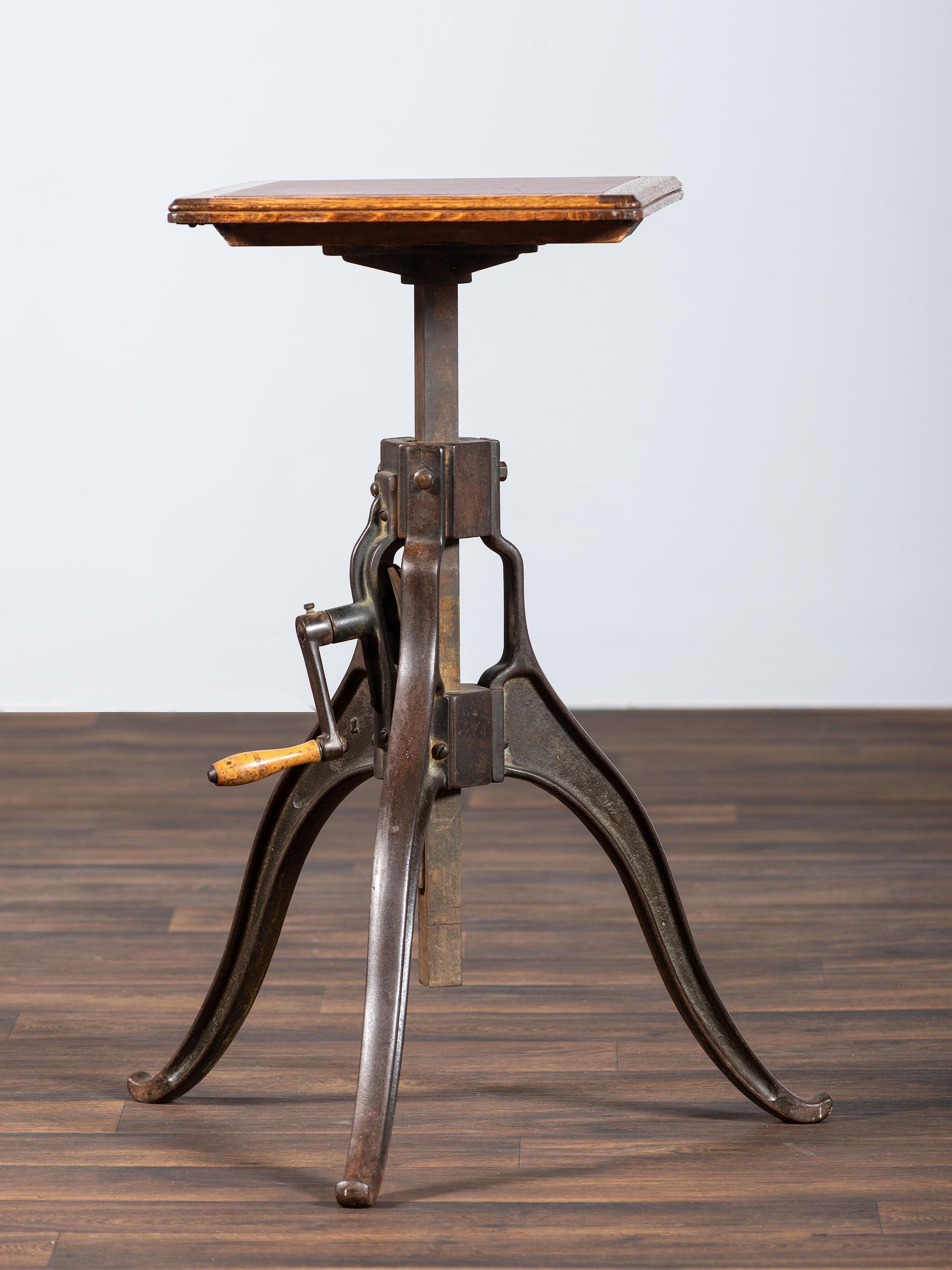 An Optometrist's Iron and Oak Adjustable Table