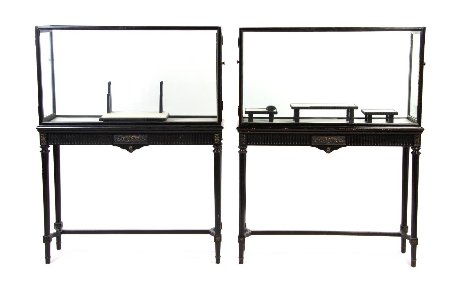 A Pair of Neoclassical Painted Vitrine Cabinets, Height 49 1/2 x width 64 1/4 x depth 21 1/2 inches.