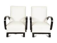 A Pair of Ebonized Oak Lounge Chairs