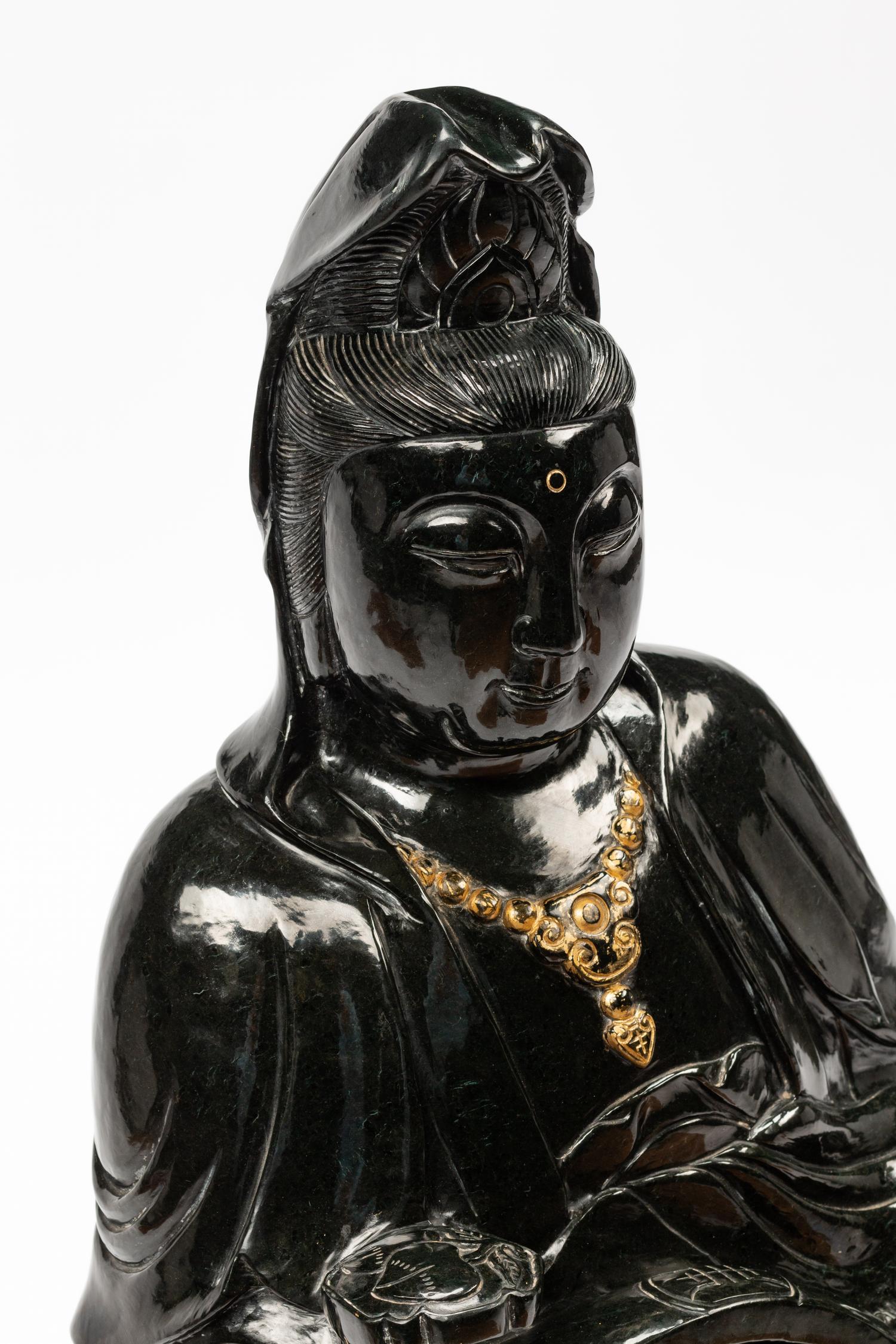 A Chinese Export Carved Jade Figure of Guanyin