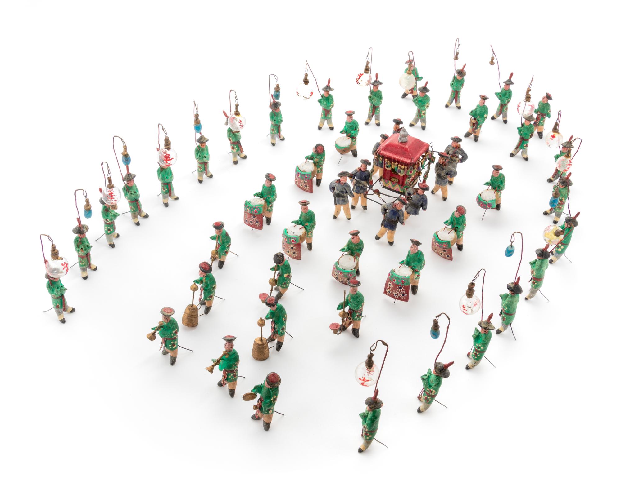 A Set of Chinese Ceramic Figures Depicting a Wedding March Height of tallest figure 4 inches. — EARLY 20TH CENTURY
