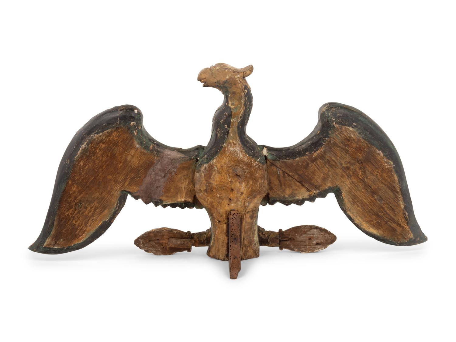 A Carved, Painted and Gilded Eagle Ornament