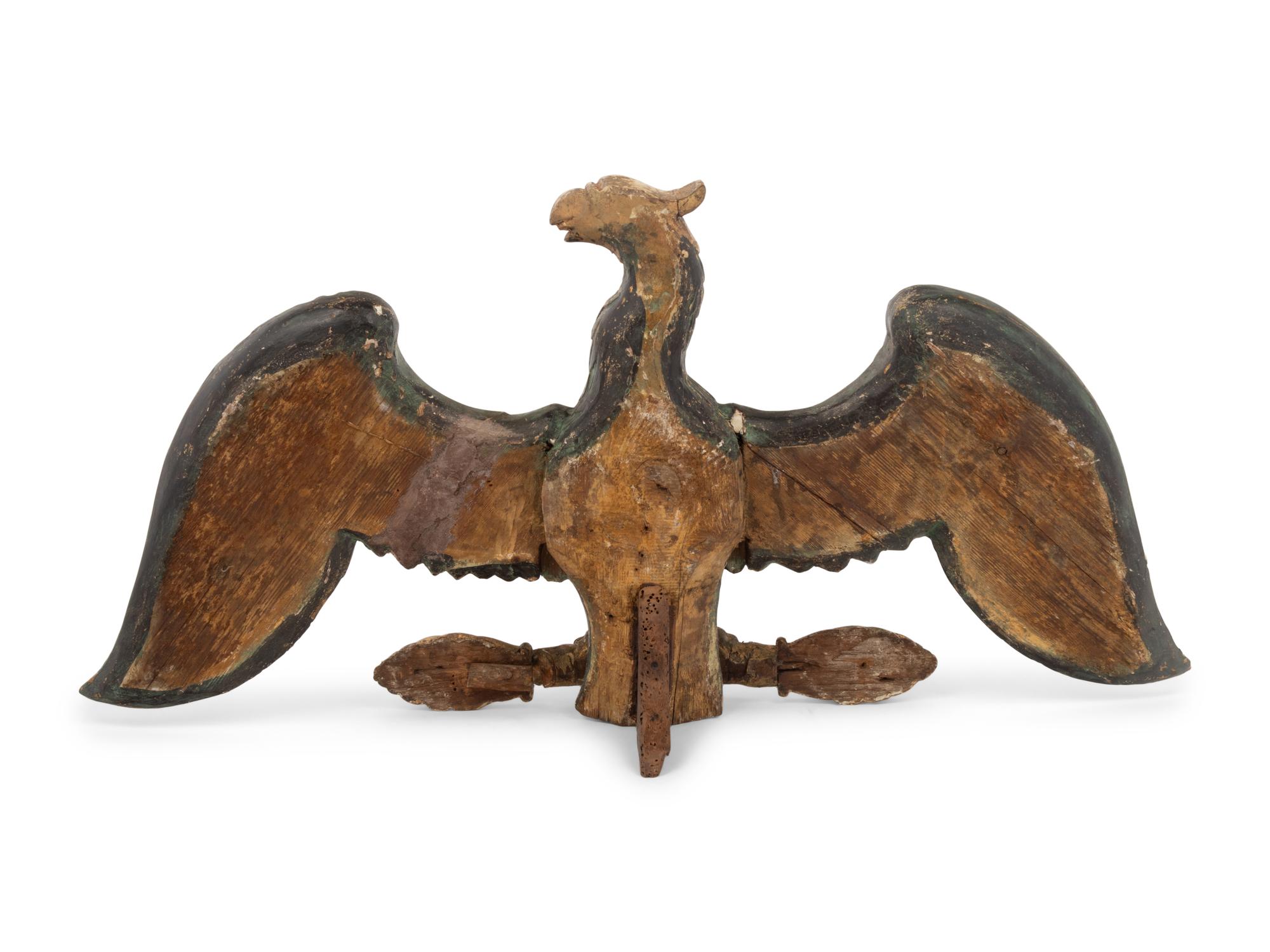 A Carved, Painted and Gilded Eagle Ornament