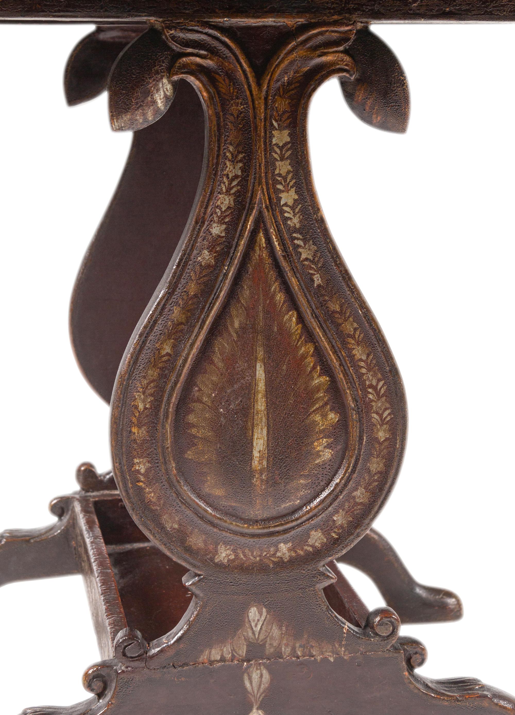A Northern European Brown-Painted and Parcel-Gilt Sofa Table