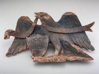 A Carved Walnut Customs House Eagle