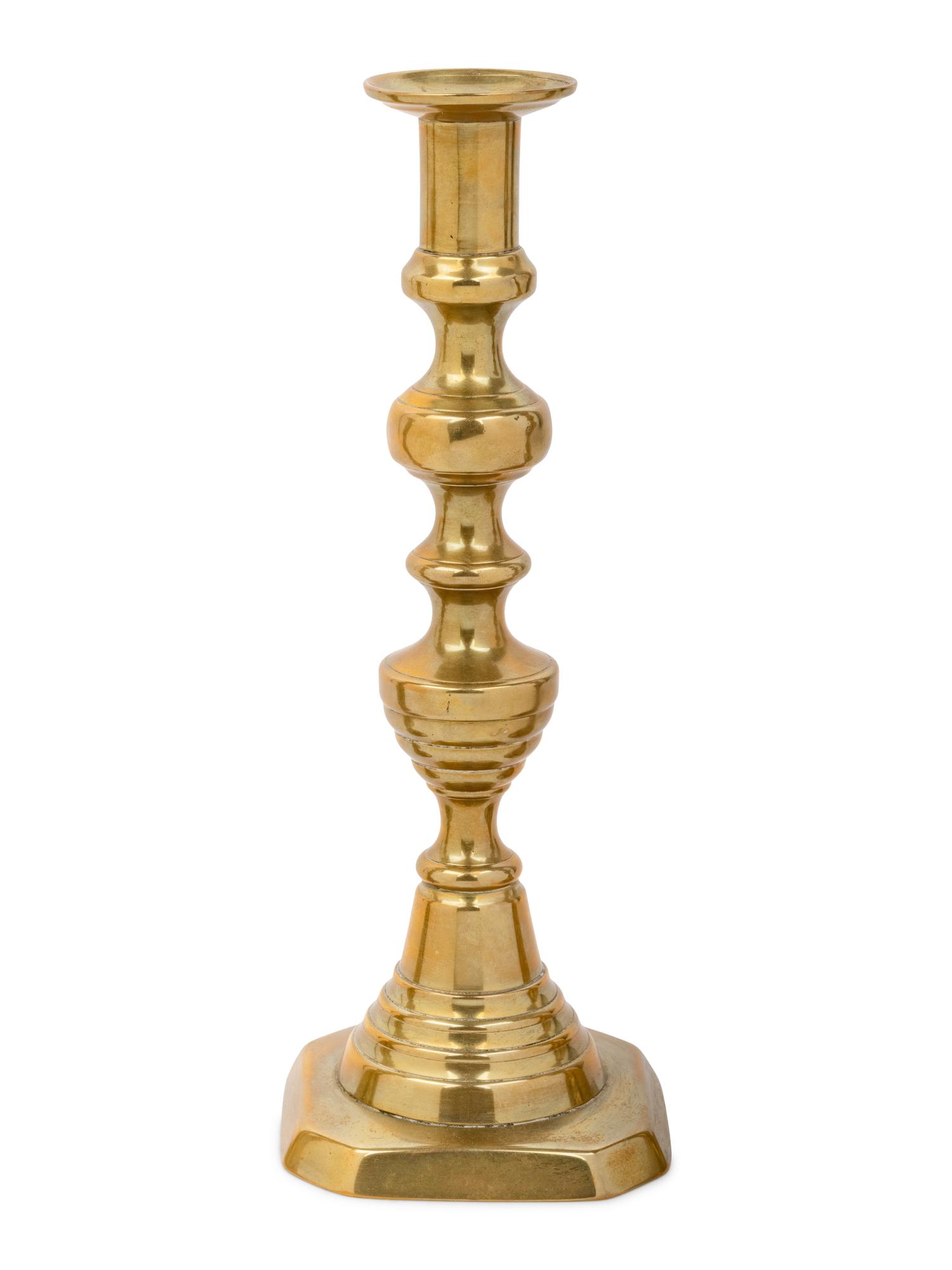 Four English Diamond Pattern Brass Candlesticks