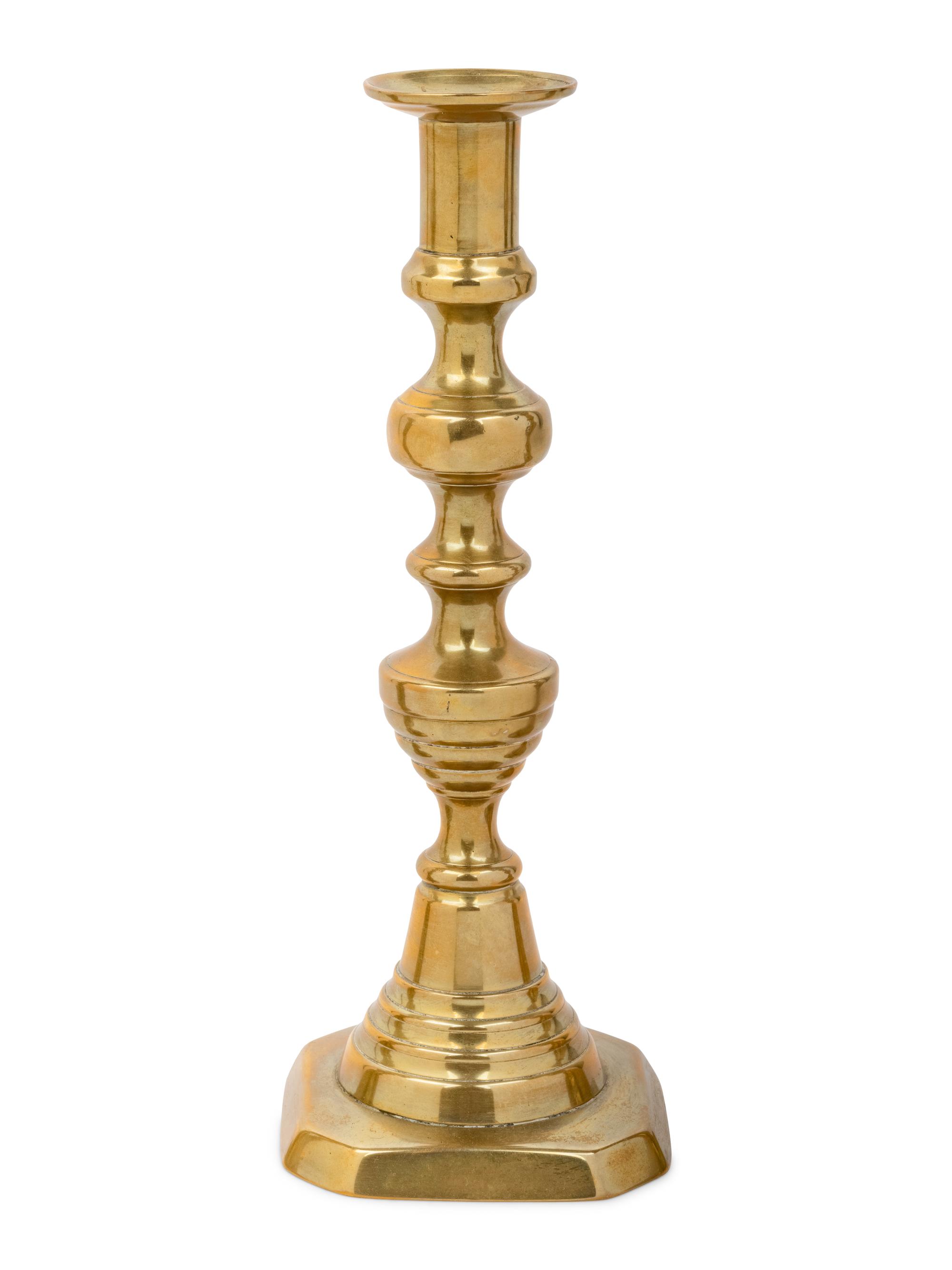 Four English Diamond Pattern Brass Candlesticks