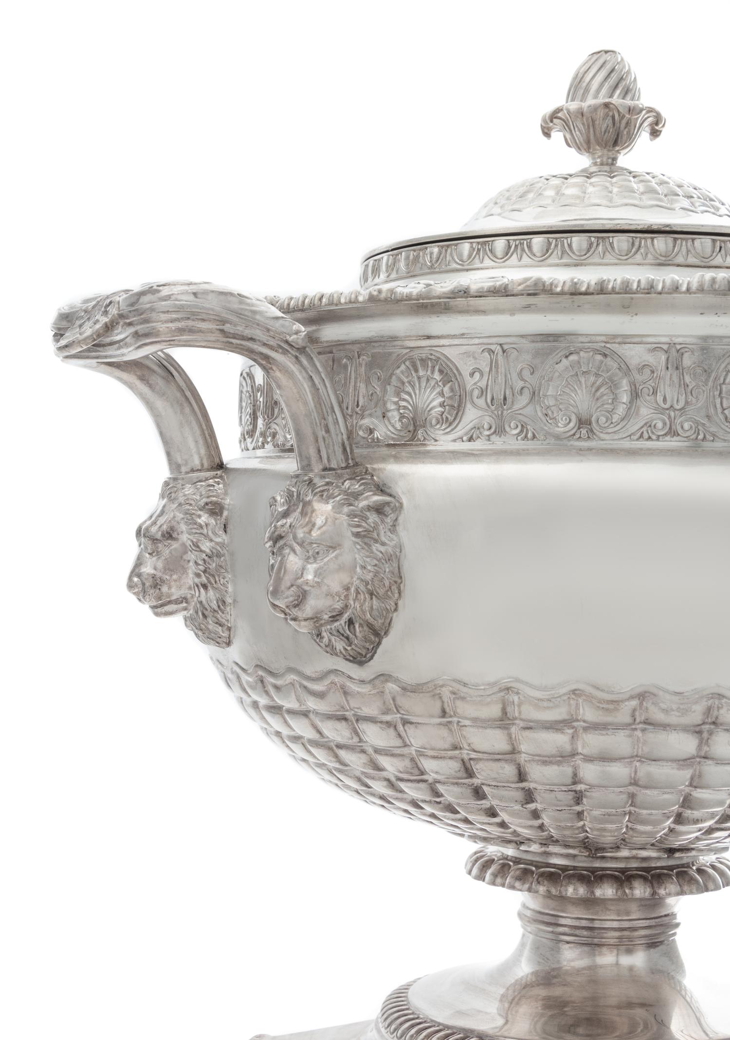 A George III Silver Tea Urn, Paul Storr, London, 1813, the domed lid with a blossom finial, the body with a gadroon and rocaille rim ab