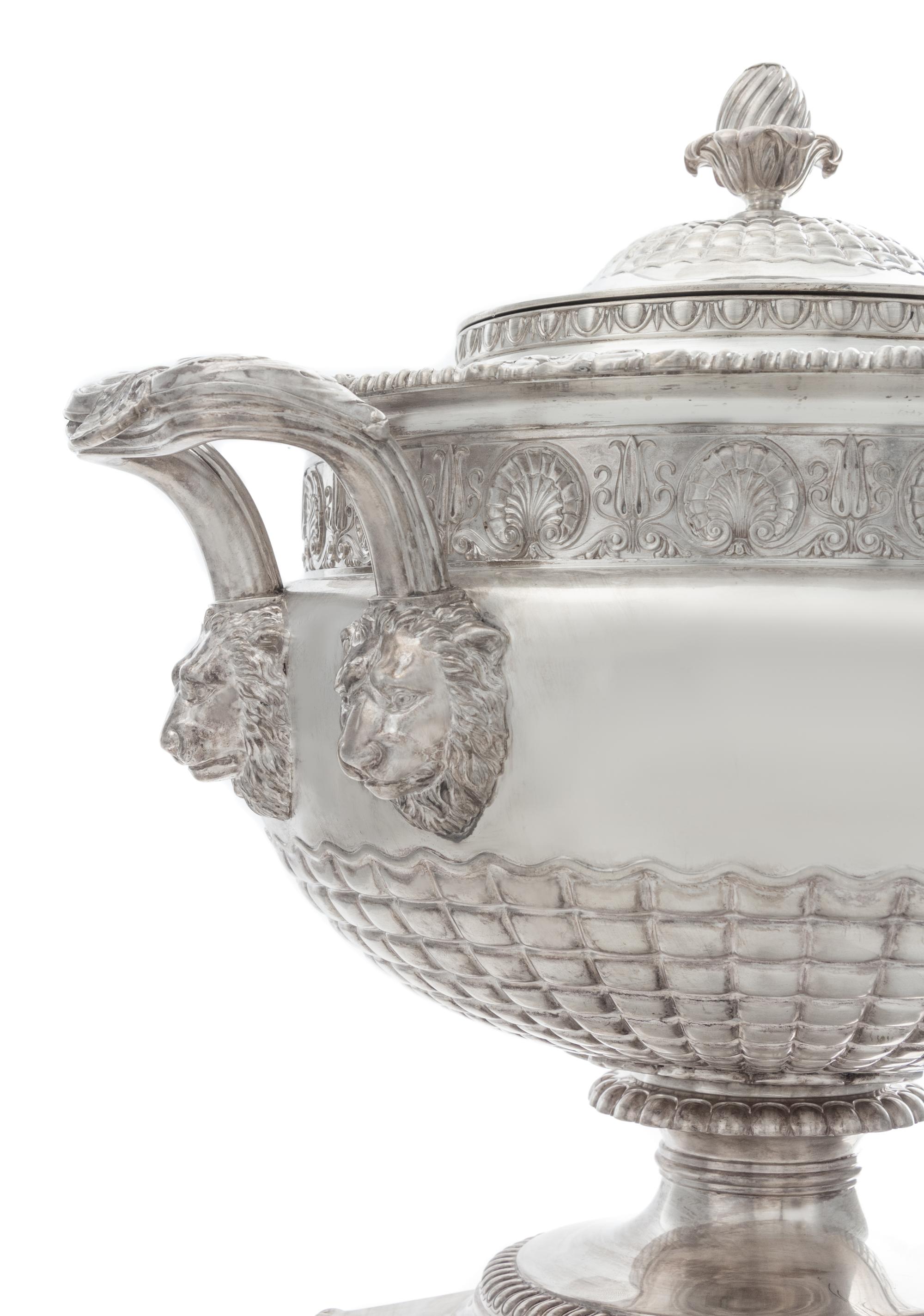 A George III Silver Tea Urn, Paul Storr, London, 1813, the domed lid with a blossom finial, the body with a gadroon and rocaille rim ab