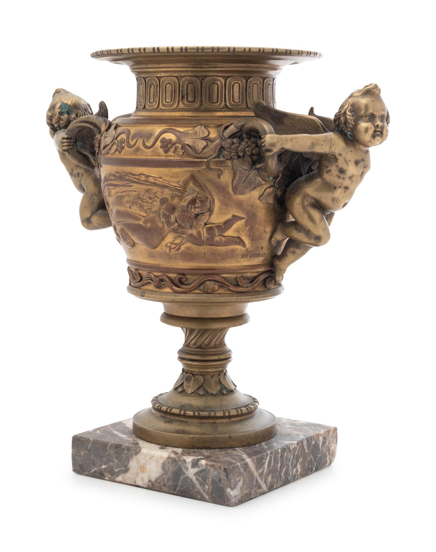 A Neoclassical Gilt Bronze Urn