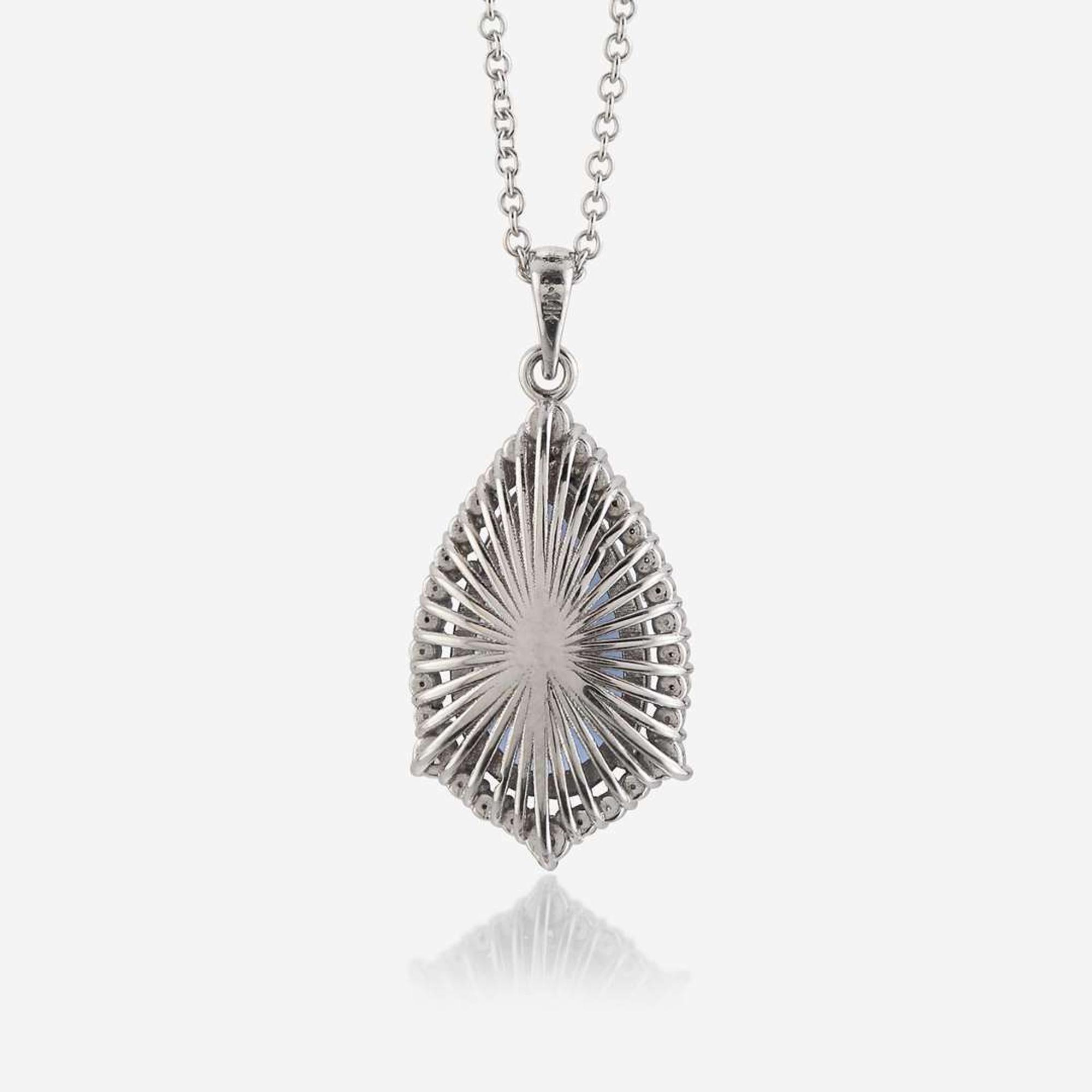 A tanzanite, diamond, and eighteen karat white gold pendant and necklace