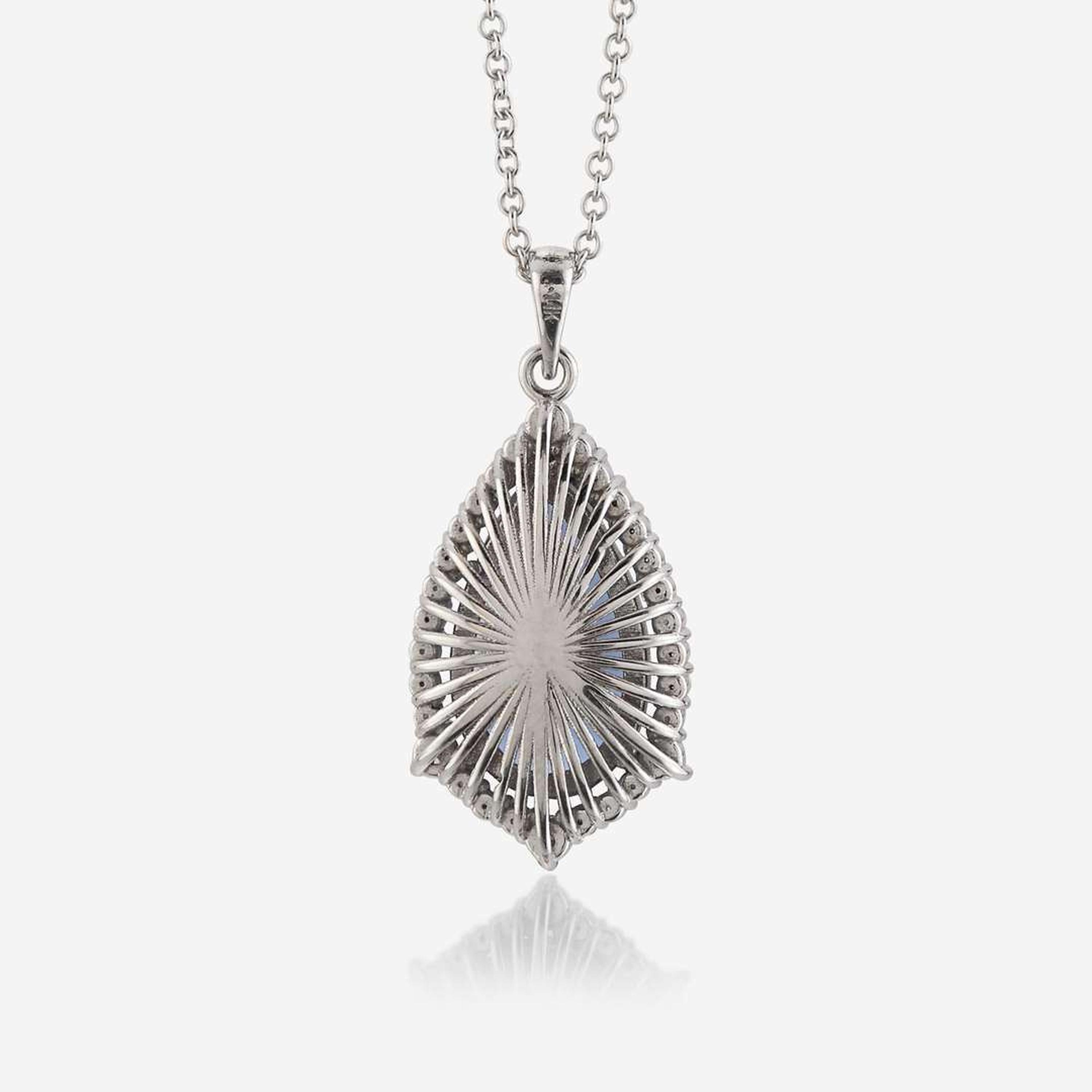 A tanzanite, diamond, and eighteen karat white gold pendant and necklace