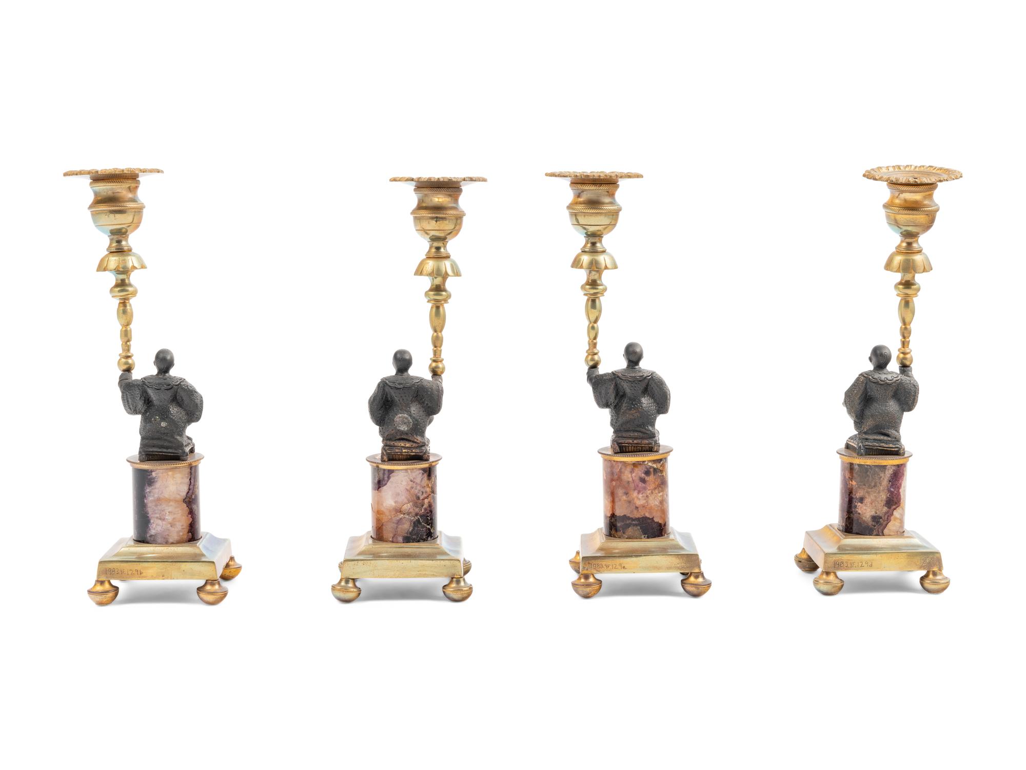 A Set of Four Gilt Metal and 'Blue John' Figural Candlesticks