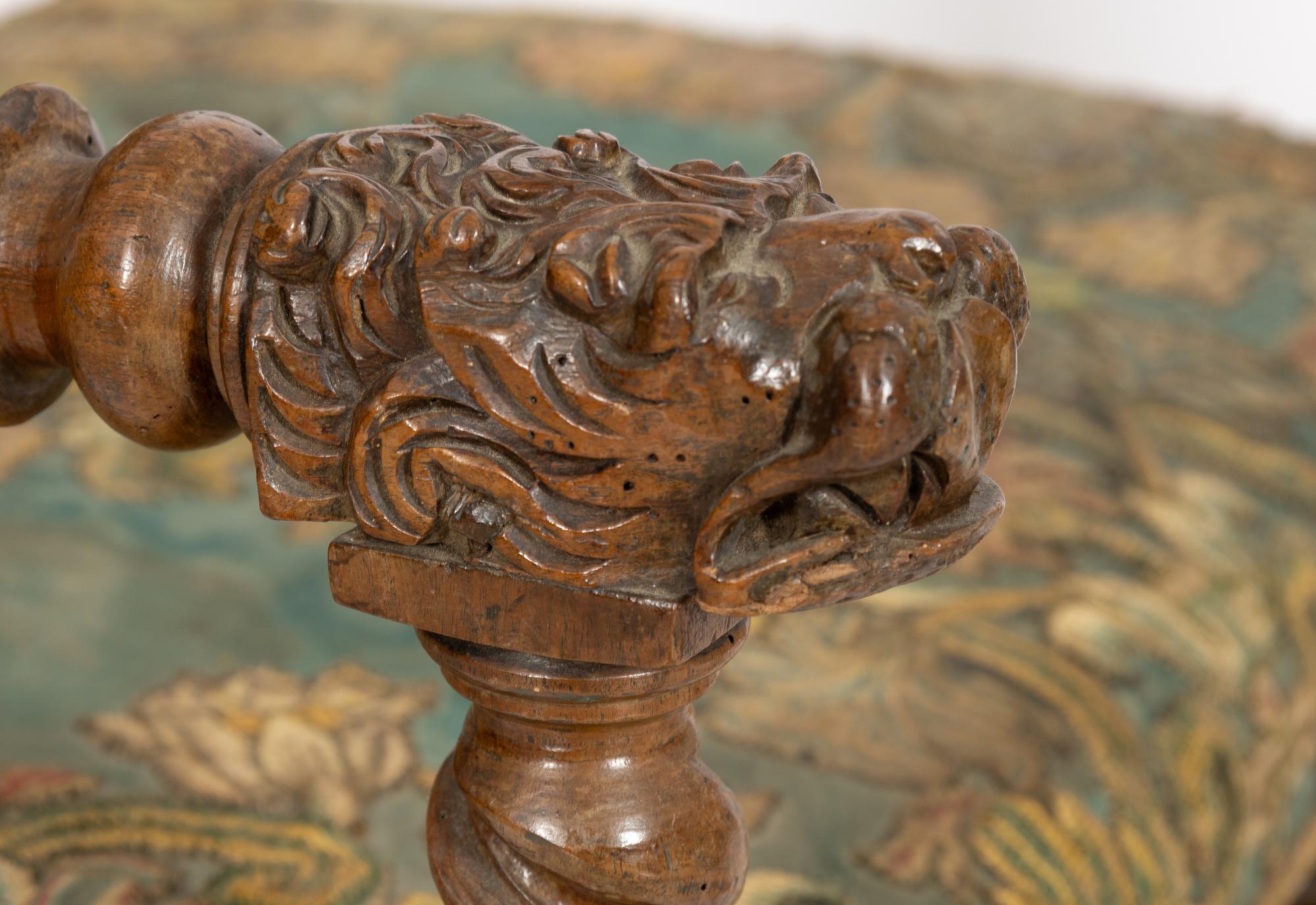 A Pair of Jacobean Carved Walnut Armchairs