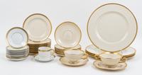 A Collection of Gold-Rimmed Porcelain Serviceware. Diameter of dinner plate 10 1/4 inches.