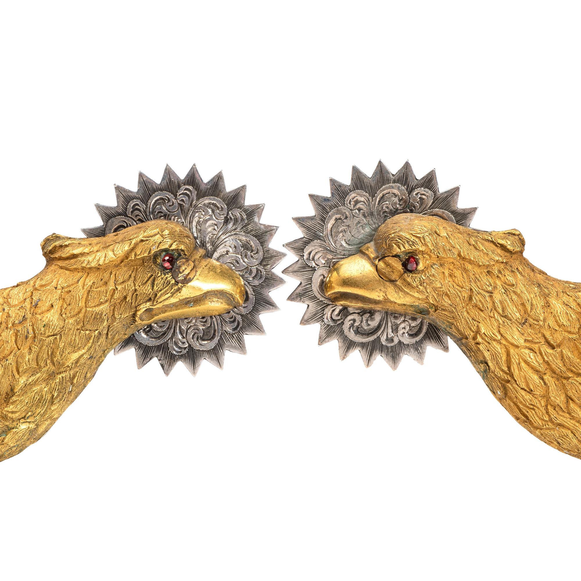 Ornate privately purchased brass eagle spurs.