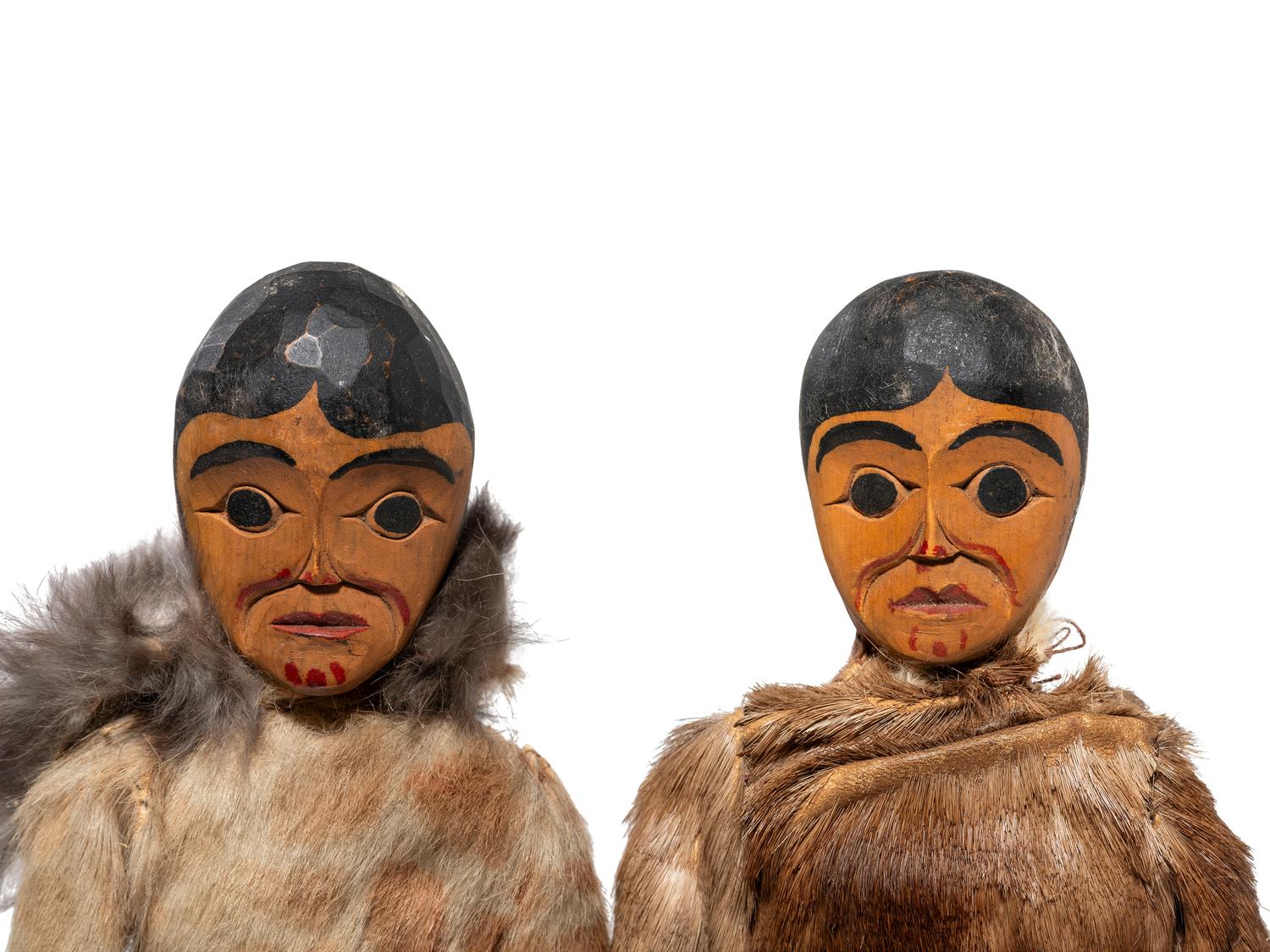 Pair of Haida Carved Wood Dolls